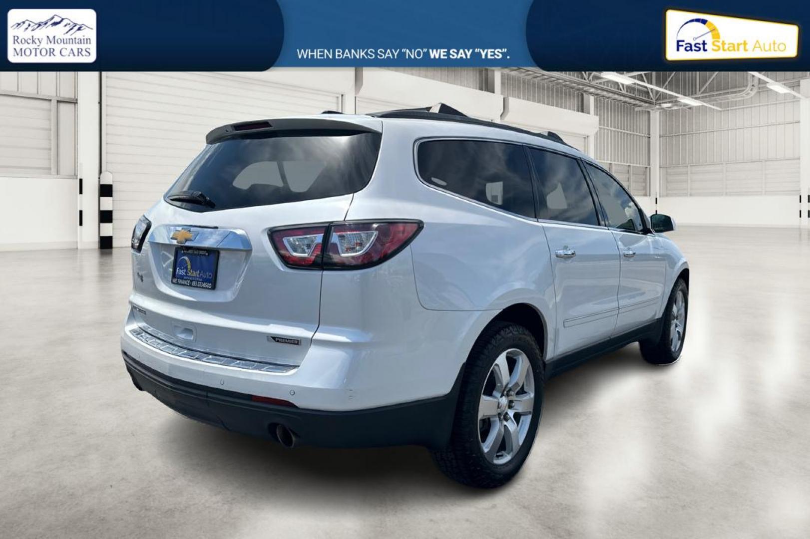 2017 White Chevrolet Traverse Premier FWD (1GNKRJKDXHJ) with an 3.6L V6 DOHC 24V engine, 6A transmission, located at 767 S State Road, Pleasant Grove, UT, 84062, (801) 785-1058, 40.354839, -111.736687 - Photo#2