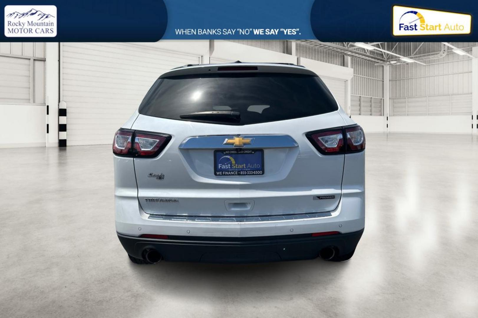 2017 White Chevrolet Traverse Premier FWD (1GNKRJKDXHJ) with an 3.6L V6 DOHC 24V engine, 6A transmission, located at 767 S State Road, Pleasant Grove, UT, 84062, (801) 785-1058, 40.354839, -111.736687 - Photo#4
