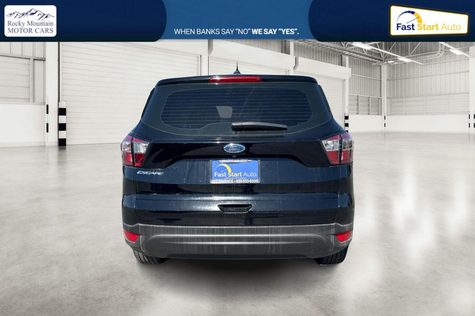2017 Black Ford Escape S FWD (1FMCU0F75HU) with an 2.5L L4 DOHC 16V engine, 6A transmission, located at 7755 State Street, Midvale, UT, 84047, (801) 753-9063, 40.610329, -111.890656 - Photo#4