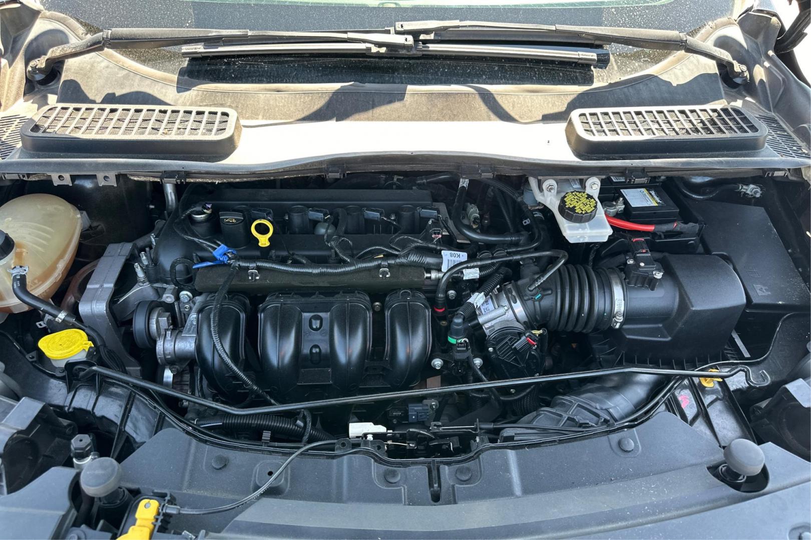 2017 Black Ford Escape S FWD (1FMCU0F75HU) with an 2.5L L4 DOHC 16V engine, 6A transmission, located at 7755 State Street, Midvale, UT, 84047, (801) 753-9063, 40.610329, -111.890656 - Photo#10
