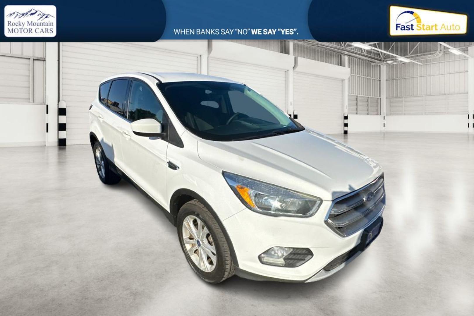 2017 White Ford Escape SE 4WD (1FMCU9GD3HU) with an 1.5L L4 DOHC 16V engine, 6A transmission, located at 7755 State Street, Midvale, UT, 84047, (801) 753-9063, 40.610329, -111.890656 - Photo#0