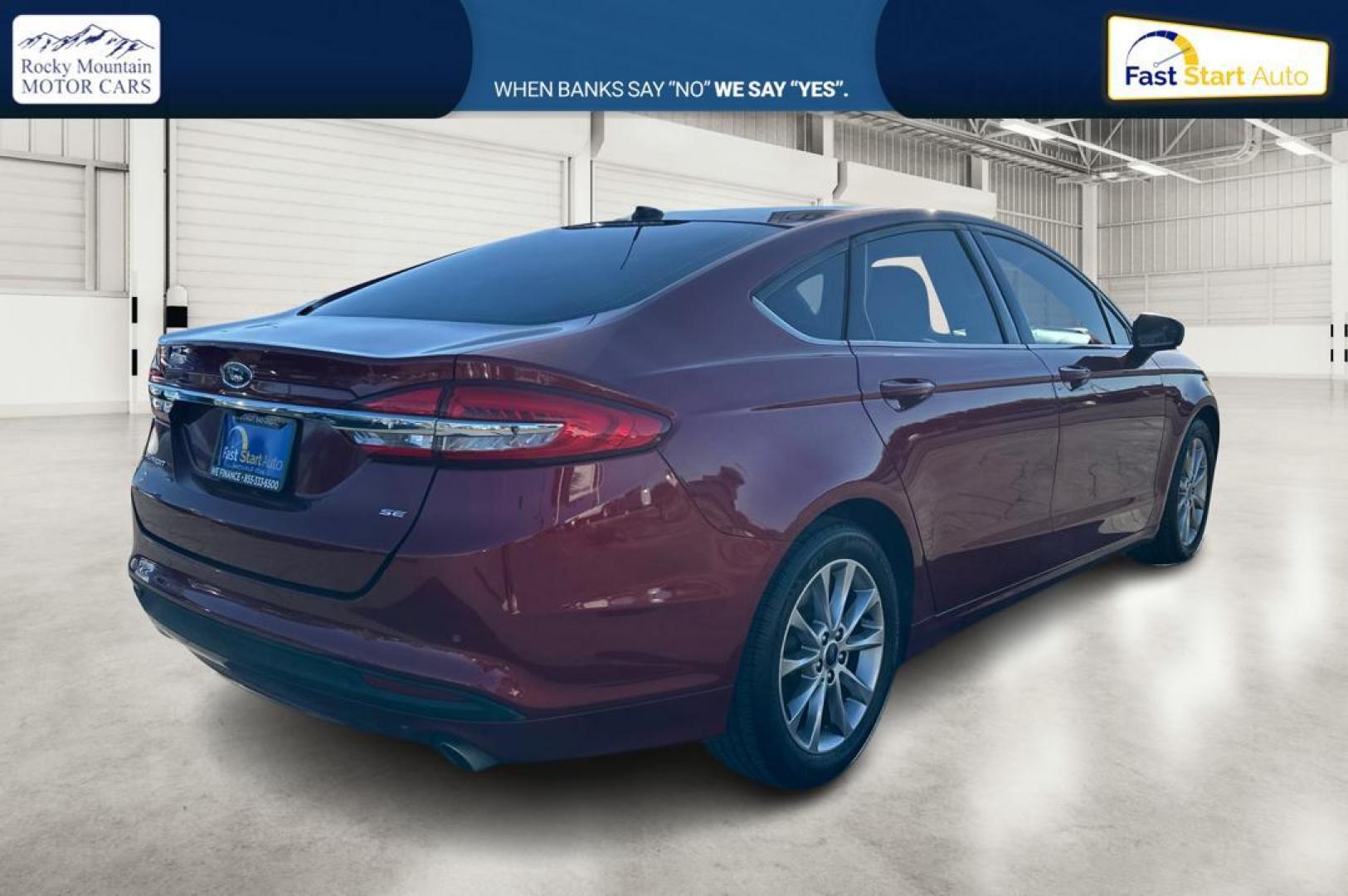 2017 Red Ford Fusion SE (3FA6P0H79HR) with an 2.5L L4 DOHC 16V engine, 6A transmission, located at 767 S State Road, Pleasant Grove, UT, 84062, (801) 785-1058, 40.354839, -111.736687 - Photo#2
