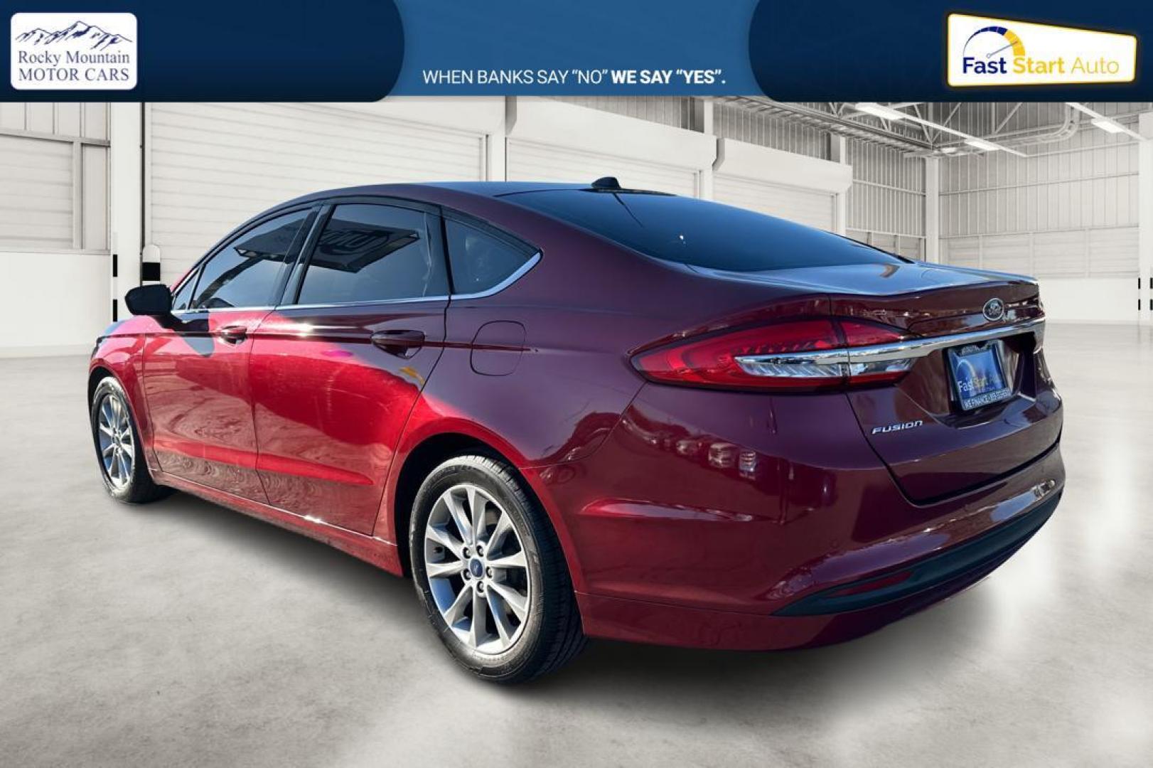 2017 Red Ford Fusion SE (3FA6P0H79HR) with an 2.5L L4 DOHC 16V engine, 6A transmission, located at 767 S State Road, Pleasant Grove, UT, 84062, (801) 785-1058, 40.354839, -111.736687 - Photo#5