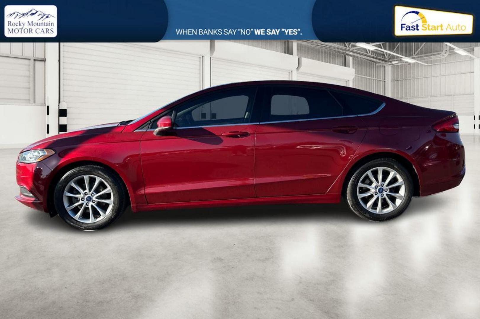 2017 Red Ford Fusion SE (3FA6P0H79HR) with an 2.5L L4 DOHC 16V engine, 6A transmission, located at 767 S State Road, Pleasant Grove, UT, 84062, (801) 785-1058, 40.354839, -111.736687 - Photo#6