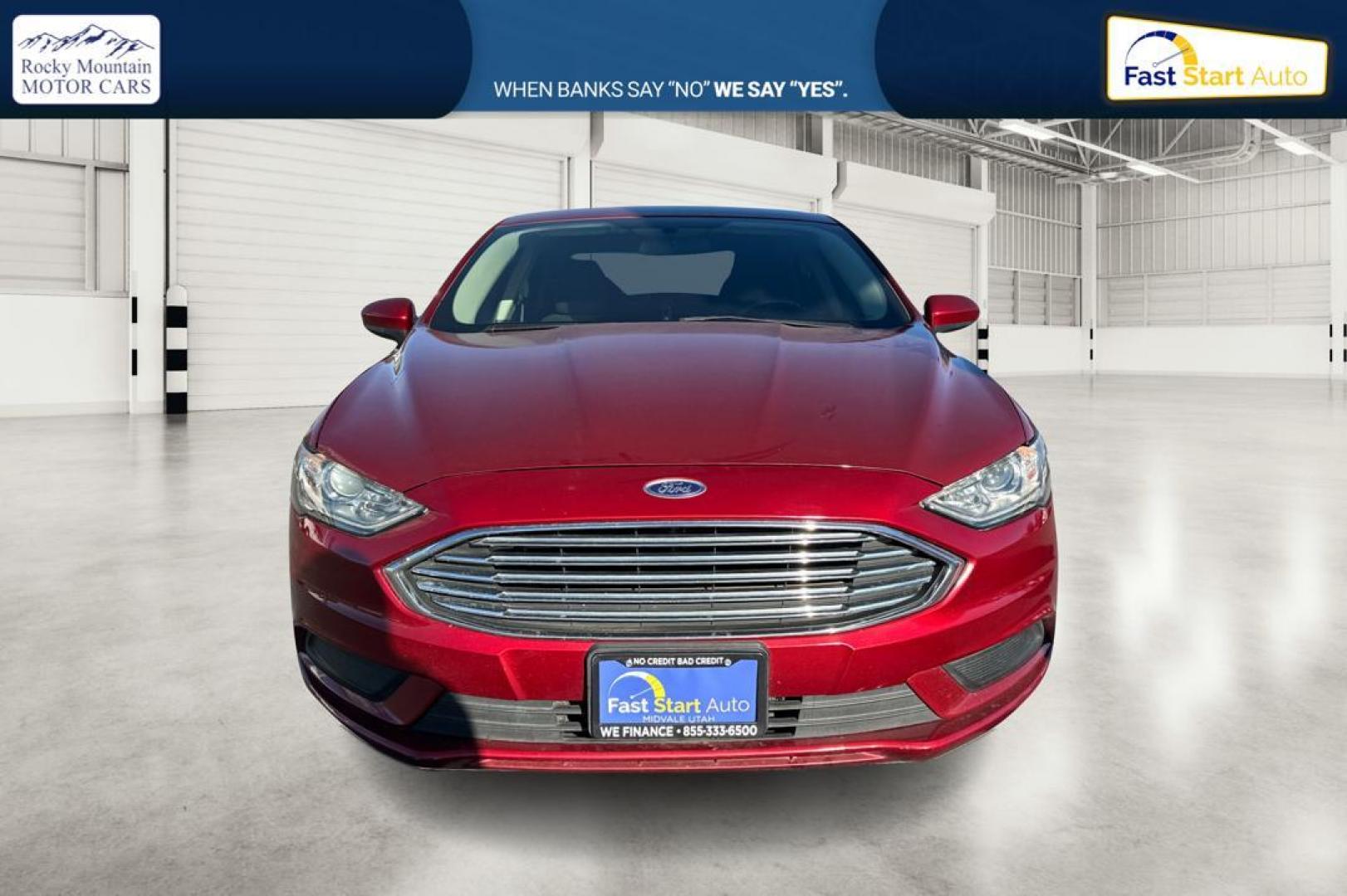 2017 Red Ford Fusion SE (3FA6P0H79HR) with an 2.5L L4 DOHC 16V engine, 6A transmission, located at 767 S State Road, Pleasant Grove, UT, 84062, (801) 785-1058, 40.354839, -111.736687 - Photo#9
