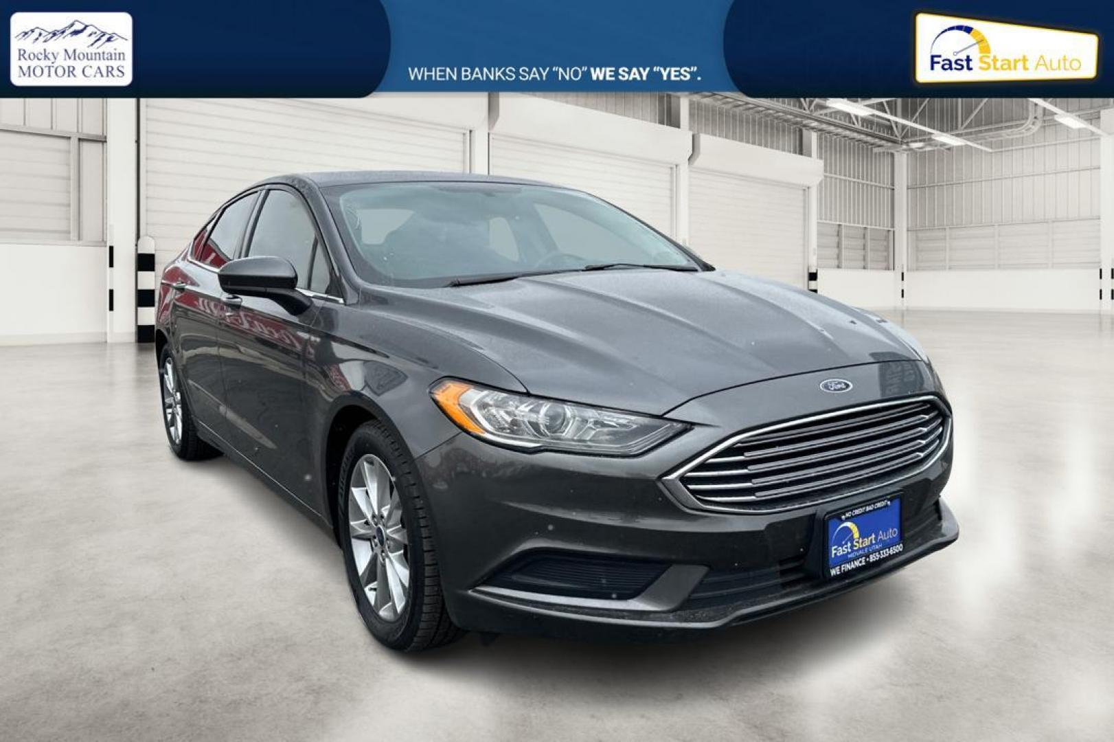 2017 Gray Ford Fusion SE (3FA6P0H73HR) with an 2.5L L4 DOHC 16V engine, 6A transmission, located at 7755 State Street, Midvale, UT, 84047, (801) 753-9063, 40.610329, -111.890656 - Photo#0
