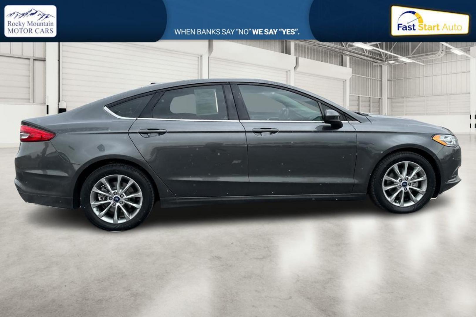 2017 Gray Ford Fusion SE (3FA6P0H73HR) with an 2.5L L4 DOHC 16V engine, 6A transmission, located at 7755 State Street, Midvale, UT, 84047, (801) 753-9063, 40.610329, -111.890656 - Photo#1