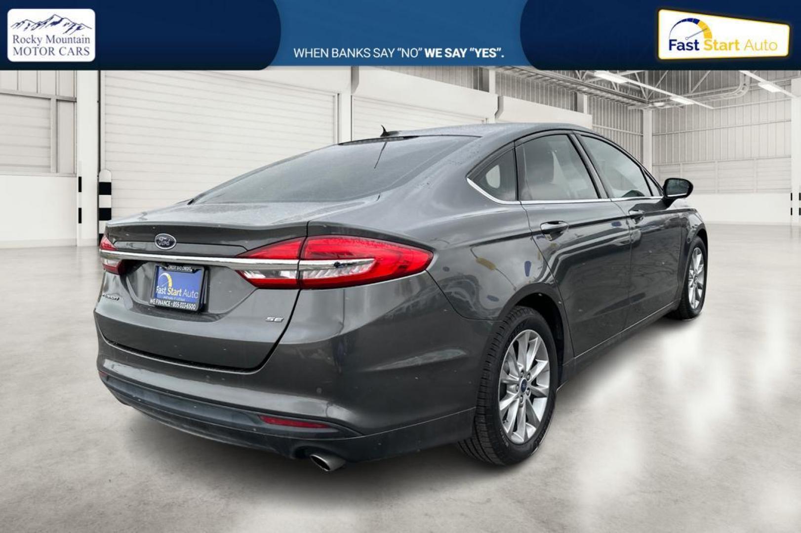 2017 Gray Ford Fusion SE (3FA6P0H73HR) with an 2.5L L4 DOHC 16V engine, 6A transmission, located at 7755 State Street, Midvale, UT, 84047, (801) 753-9063, 40.610329, -111.890656 - Photo#2