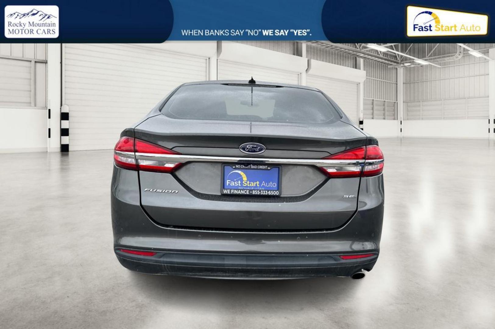 2017 Gray Ford Fusion SE (3FA6P0H73HR) with an 2.5L L4 DOHC 16V engine, 6A transmission, located at 7755 State Street, Midvale, UT, 84047, (801) 753-9063, 40.610329, -111.890656 - Photo#4