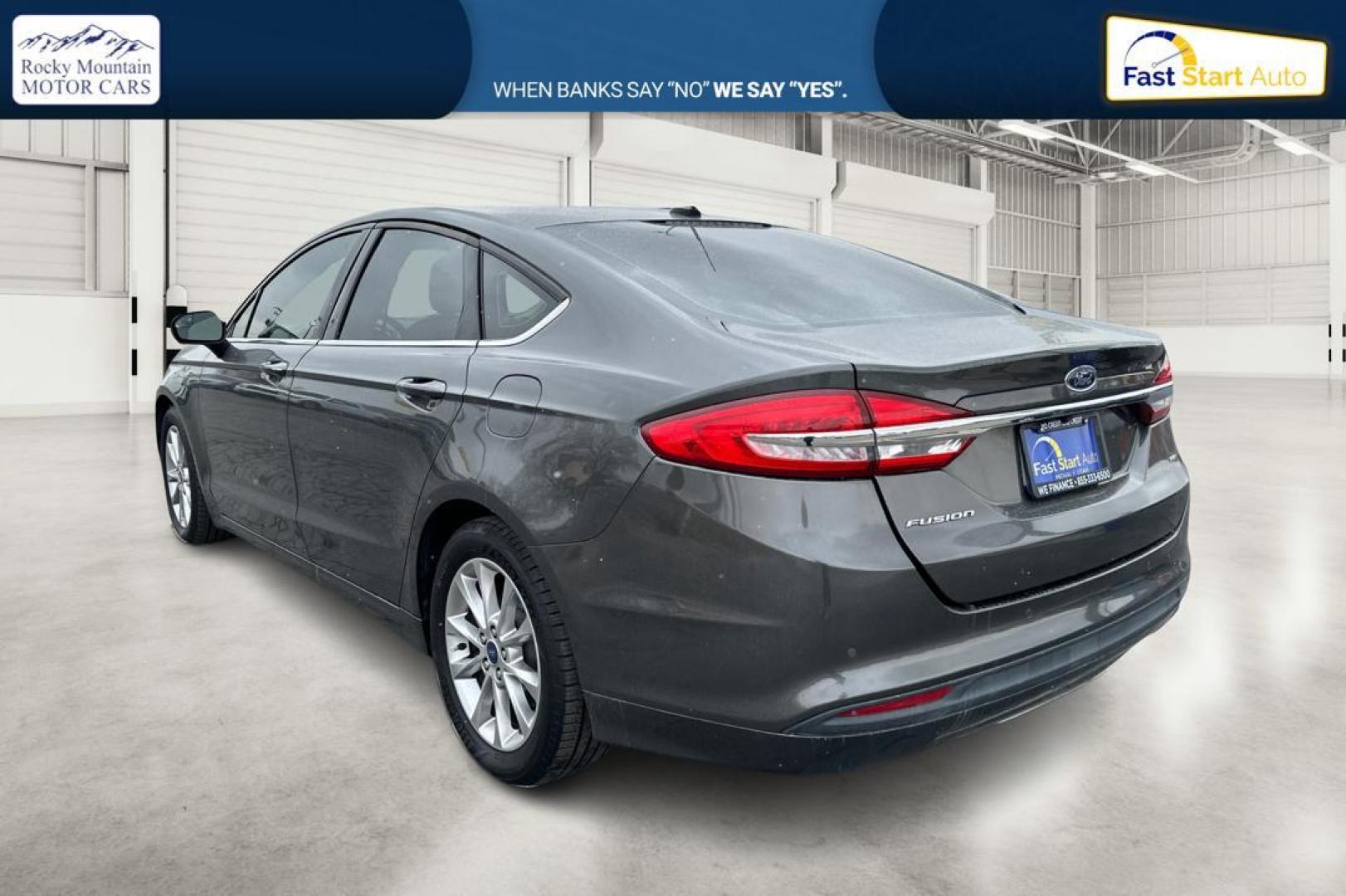 2017 Gray Ford Fusion SE (3FA6P0H73HR) with an 2.5L L4 DOHC 16V engine, 6A transmission, located at 7755 State Street, Midvale, UT, 84047, (801) 753-9063, 40.610329, -111.890656 - Photo#5