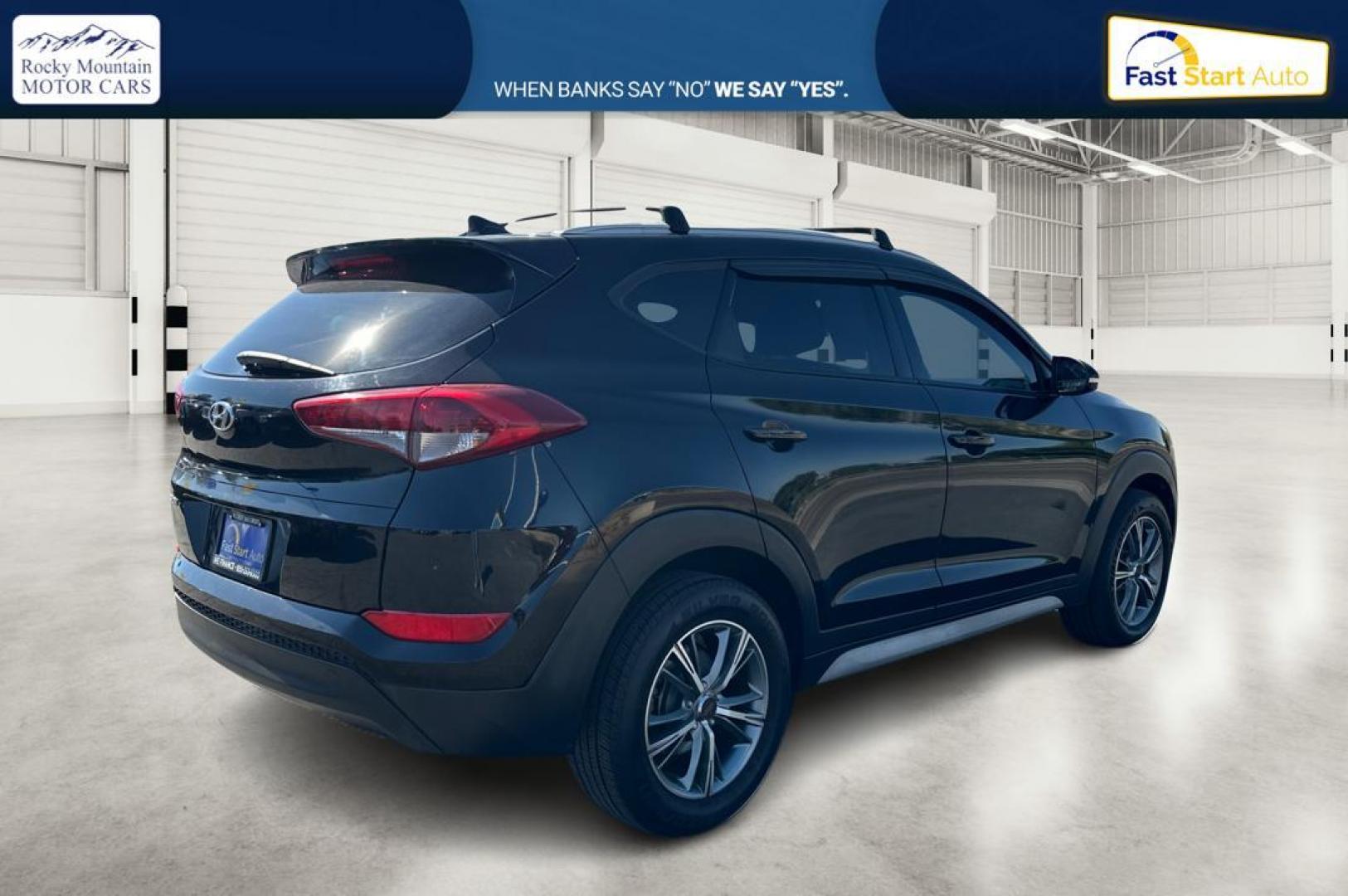 2017 Black Hyundai Tucson SE w/Preferred Package (KM8J33A41HU) with an 2.0L L4 DOHC 16V engine, 6A transmission, located at 7755 State Street, Midvale, UT, 84047, (801) 753-9063, 40.610329, -111.890656 - Photo#2