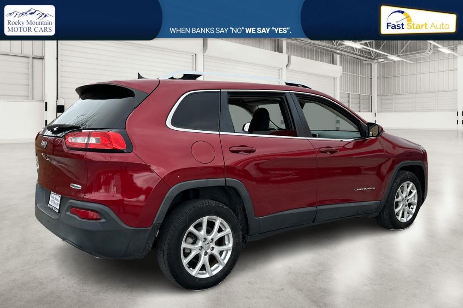2017 Red Jeep Cherokee Latitude FWD (1C4PJLCB0HD) with an 2.4L L4 DOHC 16V engine, 9A transmission, located at 767 S State Road, Pleasant Grove, UT, 84062, (801) 785-1058, 40.354839, -111.736687 - Photo#2