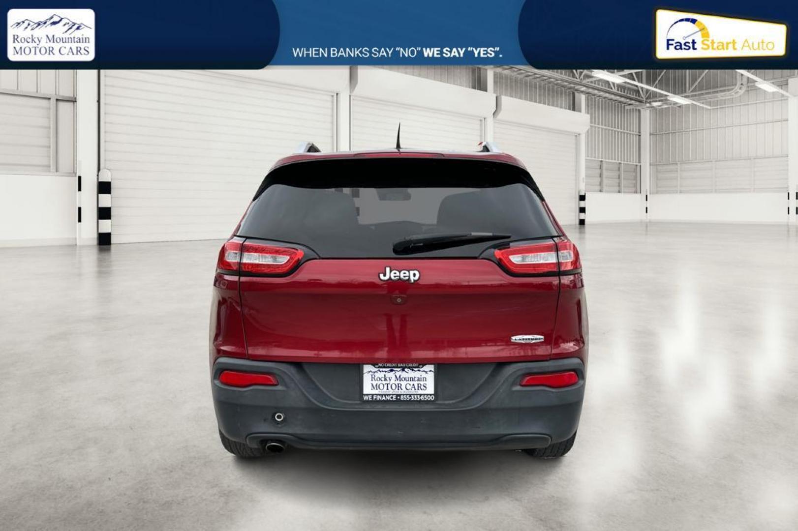 2017 Red Jeep Cherokee Latitude FWD (1C4PJLCB0HD) with an 2.4L L4 DOHC 16V engine, 9A transmission, located at 767 S State Road, Pleasant Grove, UT, 84062, (801) 785-1058, 40.354839, -111.736687 - Photo#4