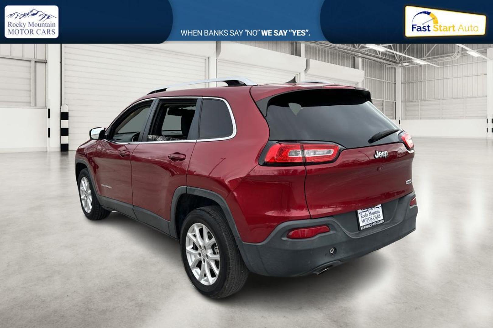 2017 Red Jeep Cherokee Latitude FWD (1C4PJLCB0HD) with an 2.4L L4 DOHC 16V engine, 9A transmission, located at 767 S State Road, Pleasant Grove, UT, 84062, (801) 785-1058, 40.354839, -111.736687 - Photo#5