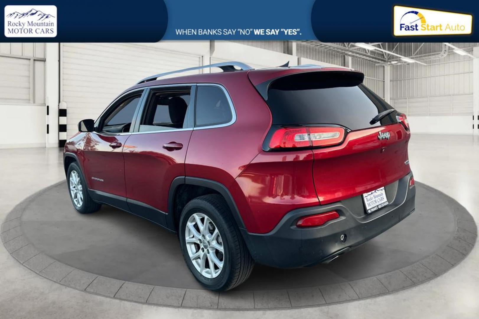 2017 Red Jeep Cherokee Latitude FWD (1C4PJLCB0HD) with an 2.4L L4 DOHC 16V engine, 9A transmission, located at 767 S State Road, Pleasant Grove, UT, 84062, (801) 785-1058, 40.354839, -111.736687 - Photo#4