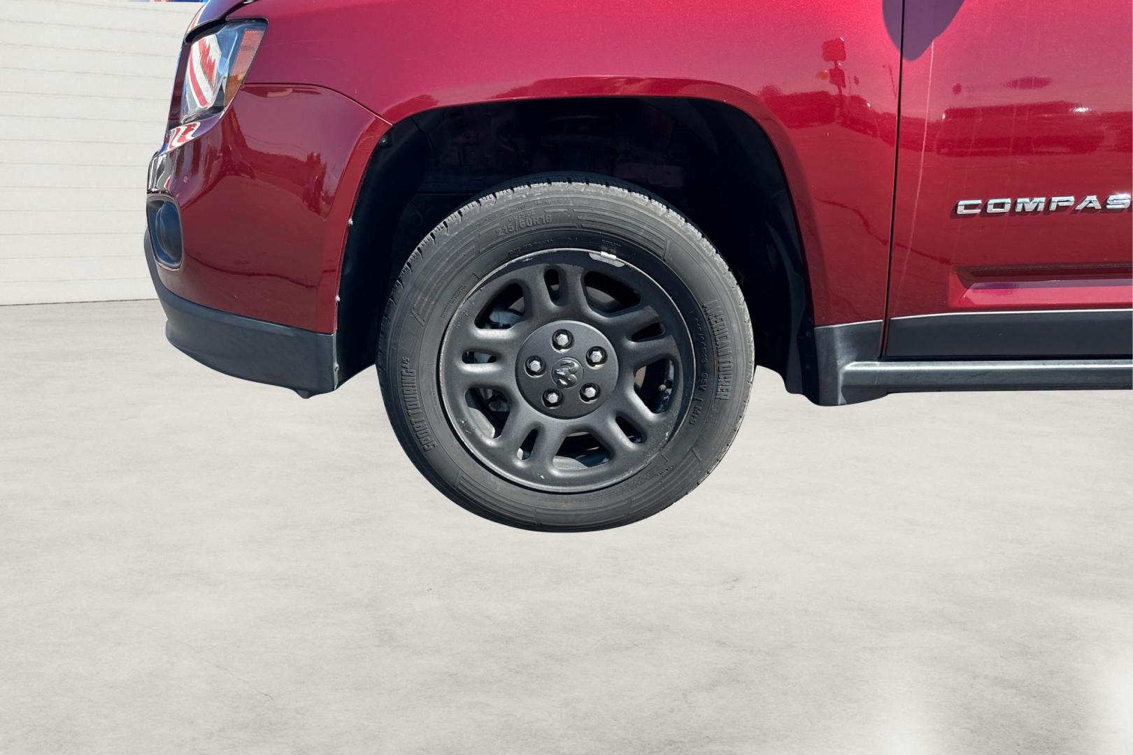 2017 Red Jeep Compass Latitude FWD (1C4NJCEB3HD) with an 2.4L L4 DOHC 16V engine, CVT transmission, located at 767 S State Road, Pleasant Grove, UT, 84062, (801) 785-1058, 40.354839, -111.736687 - Photo#9