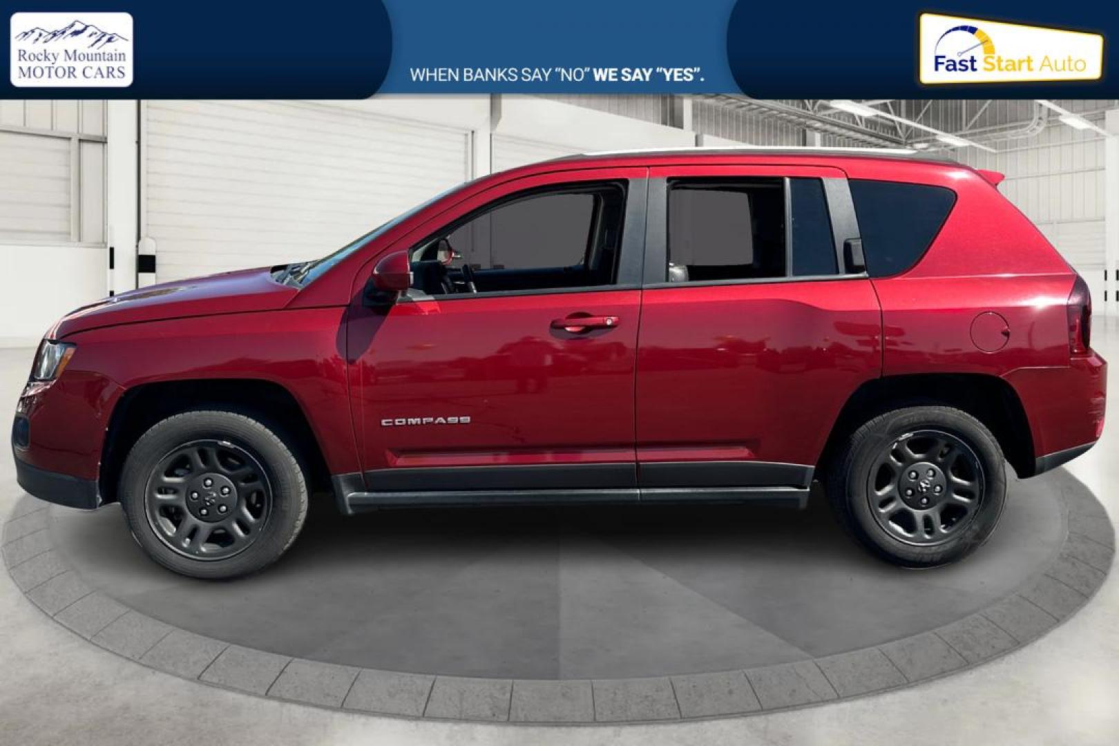 2017 Red Jeep Compass Latitude FWD (1C4NJCEB3HD) with an 2.4L L4 DOHC 16V engine, CVT transmission, located at 767 S State Road, Pleasant Grove, UT, 84062, (801) 785-1058, 40.354839, -111.736687 - Photo#5