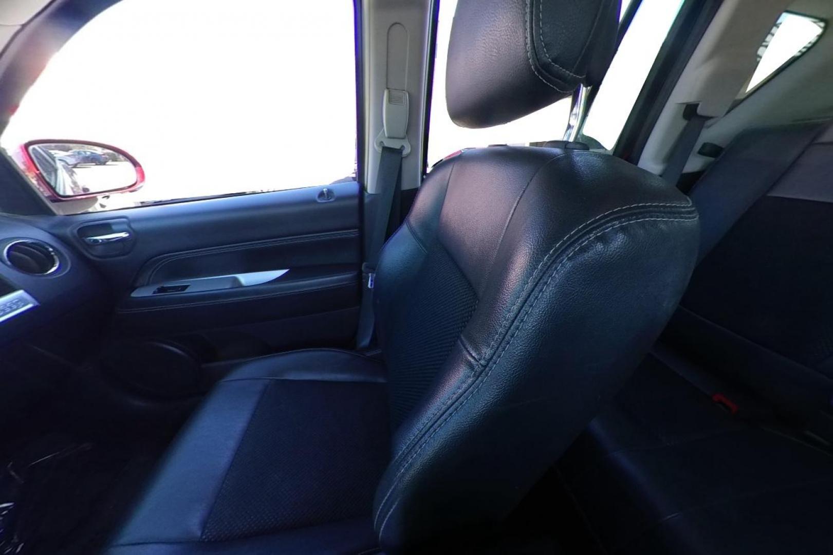 2017 Red Jeep Compass Latitude FWD (1C4NJCEB3HD) with an 2.4L L4 DOHC 16V engine, CVT transmission, located at 767 S State Road, Pleasant Grove, UT, 84062, (801) 785-1058, 40.354839, -111.736687 - Photo#12