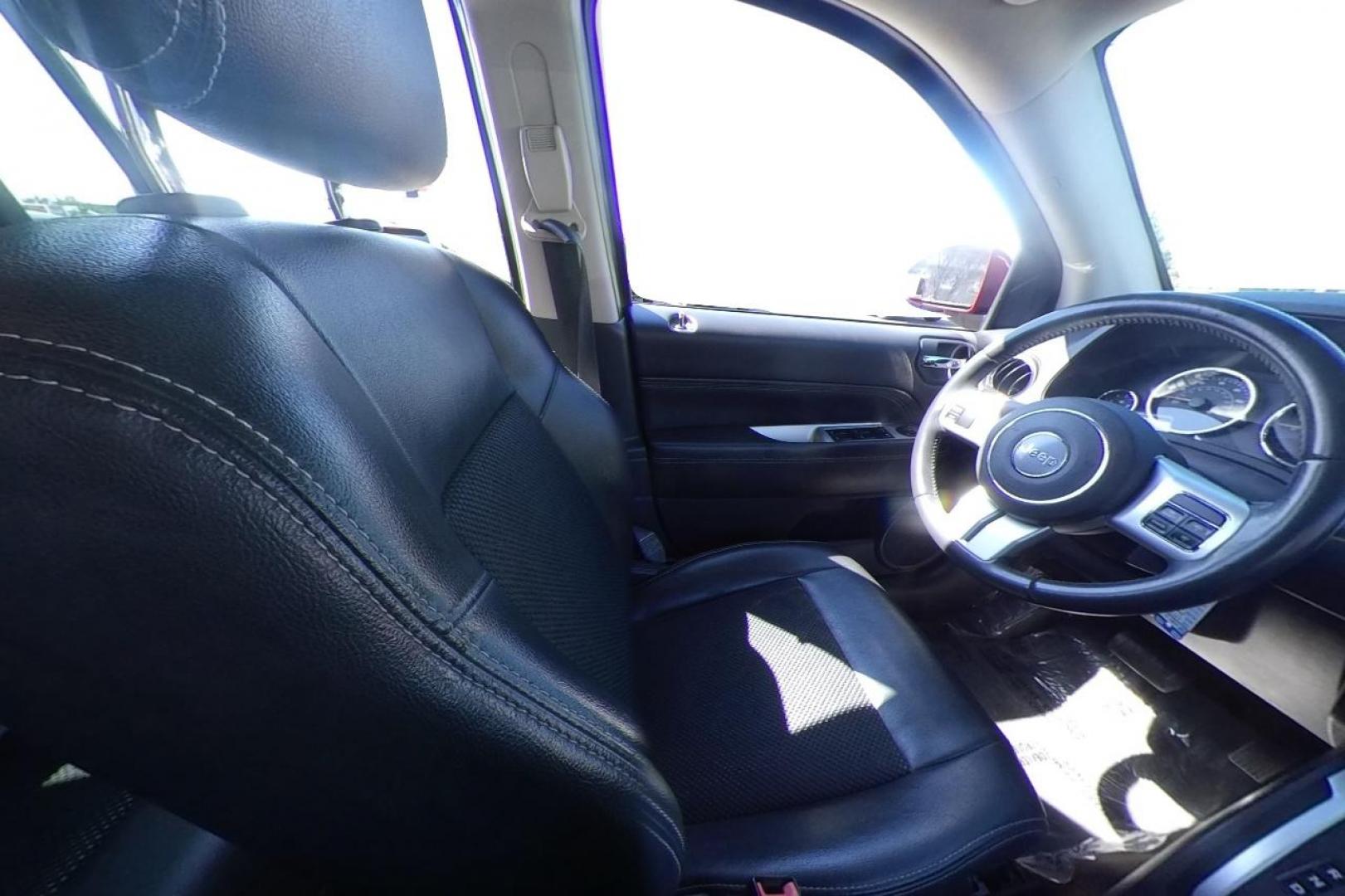 2017 Red Jeep Compass Latitude FWD (1C4NJCEB3HD) with an 2.4L L4 DOHC 16V engine, CVT transmission, located at 767 S State Road, Pleasant Grove, UT, 84062, (801) 785-1058, 40.354839, -111.736687 - Photo#14