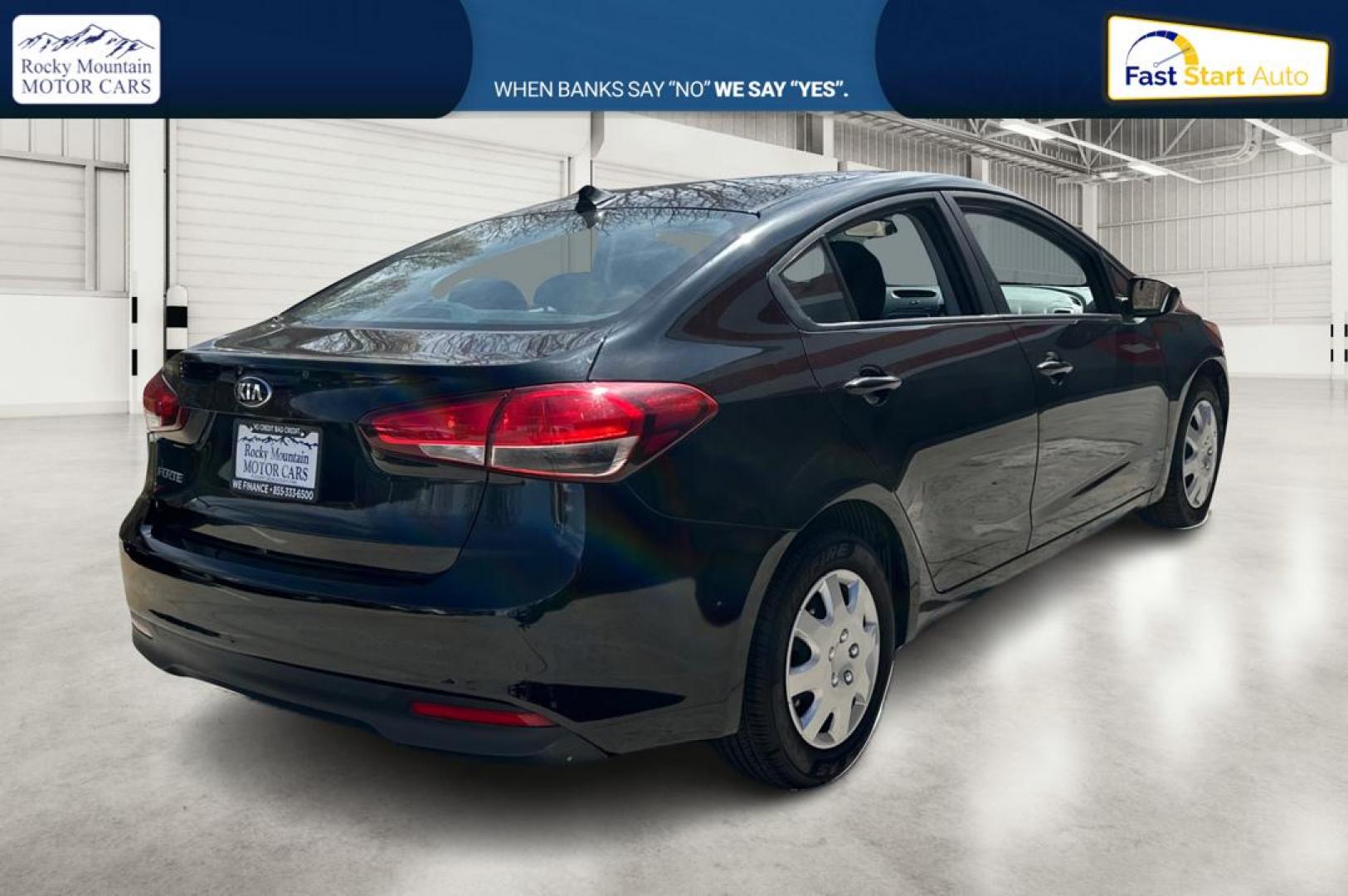2017 Black Kia Forte LX 6M (3KPFK4A75HE) with an 2.0L L4 DOHC 16V engine, 6M transmission, located at 767 S State Road, Pleasant Grove, UT, 84062, (801) 785-1058, 40.354839, -111.736687 - Photo#2