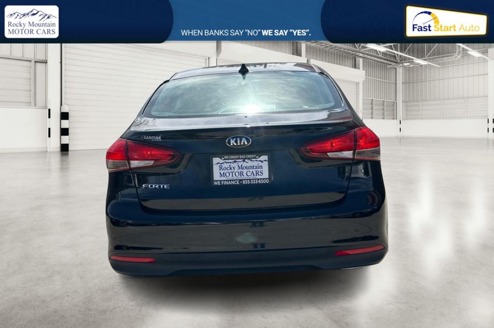 2017 Black Kia Forte LX 6M (3KPFK4A75HE) with an 2.0L L4 DOHC 16V engine, 6M transmission, located at 767 S State Road, Pleasant Grove, UT, 84062, (801) 785-1058, 40.354839, -111.736687 - Photo#4