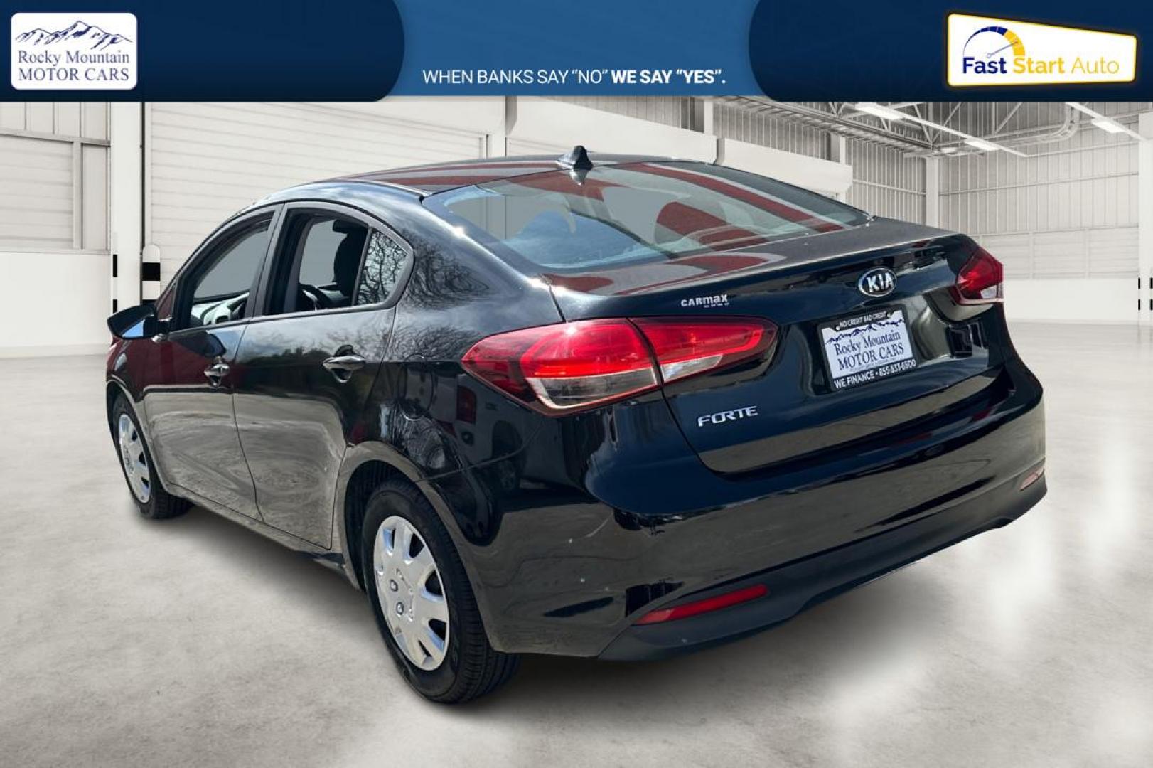 2017 Black Kia Forte LX 6M (3KPFK4A75HE) with an 2.0L L4 DOHC 16V engine, 6M transmission, located at 767 S State Road, Pleasant Grove, UT, 84062, (801) 785-1058, 40.354839, -111.736687 - Photo#5