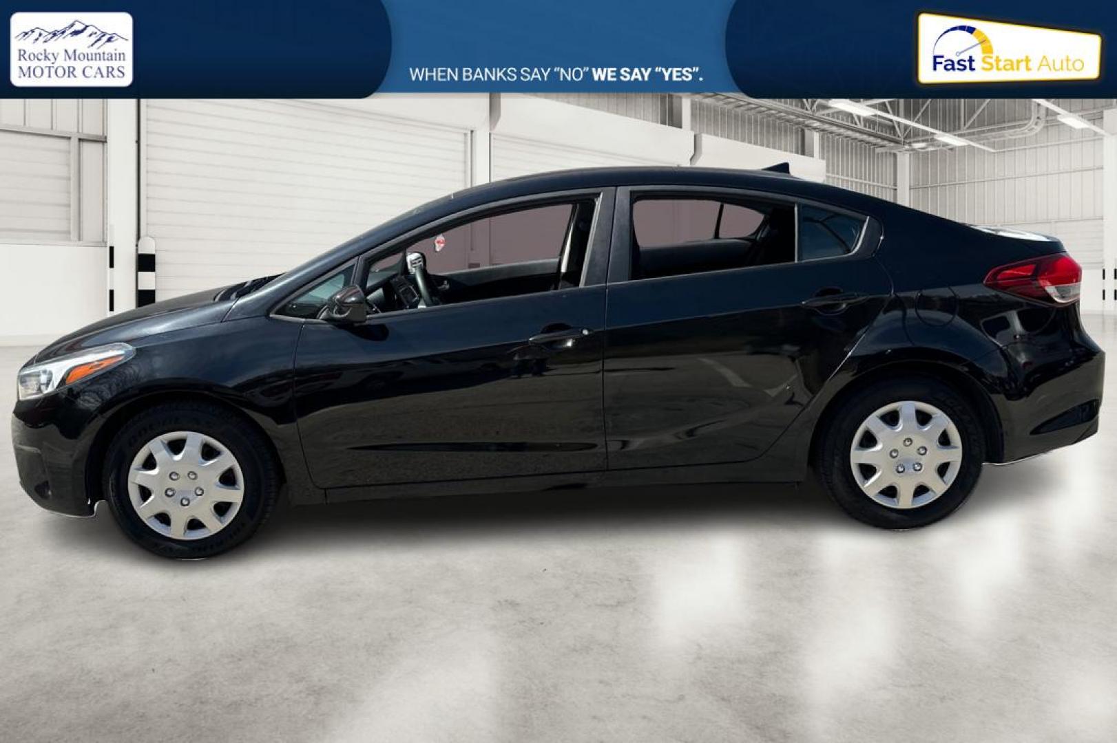 2017 Black Kia Forte LX 6M (3KPFK4A75HE) with an 2.0L L4 DOHC 16V engine, 6M transmission, located at 767 S State Road, Pleasant Grove, UT, 84062, (801) 785-1058, 40.354839, -111.736687 - Photo#6