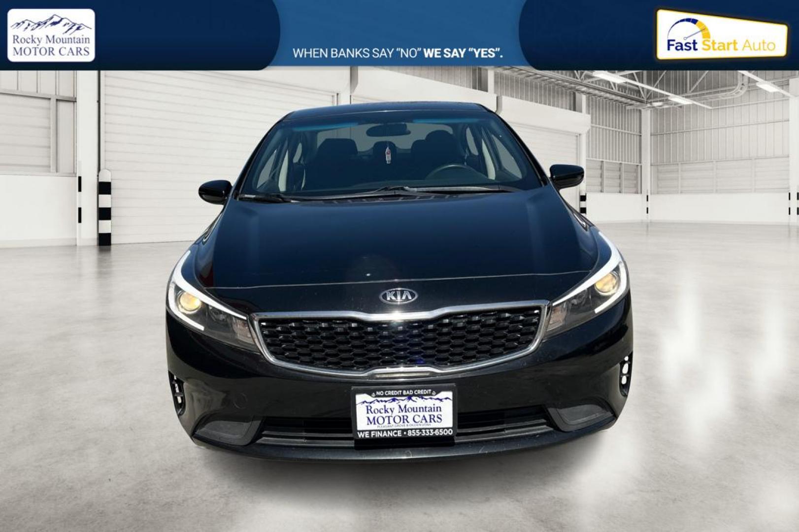 2017 Black Kia Forte LX 6M (3KPFK4A75HE) with an 2.0L L4 DOHC 16V engine, 6M transmission, located at 767 S State Road, Pleasant Grove, UT, 84062, (801) 785-1058, 40.354839, -111.736687 - Photo#9