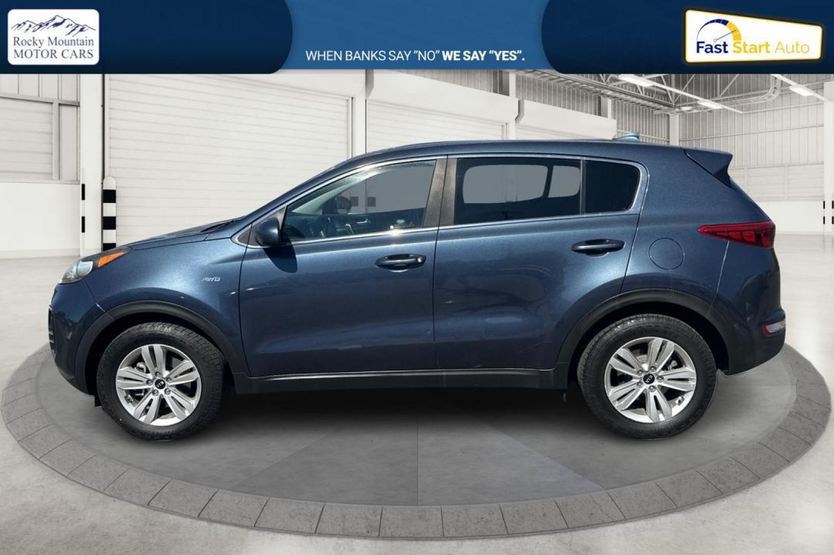 2017 Blue Kia Sportage LX AWD (KNDPMCAC1H7) with an 2.4L V6 DOHC 24V engine, 6A transmission, located at 7755 State Street, Midvale, UT, 84047, (801) 753-9063, 40.610329, -111.890656 - Photo#5