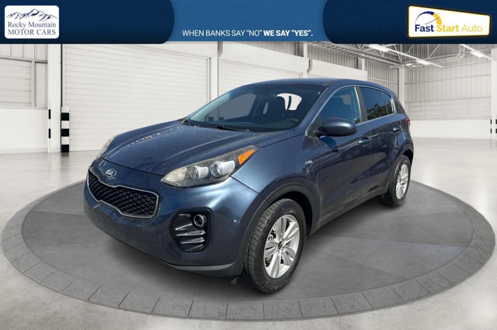 2017 Blue Kia Sportage LX AWD (KNDPMCAC1H7) with an 2.4L V6 DOHC 24V engine, 6A transmission, located at 7755 State Street, Midvale, UT, 84047, (801) 753-9063, 40.610329, -111.890656 - Photo#6