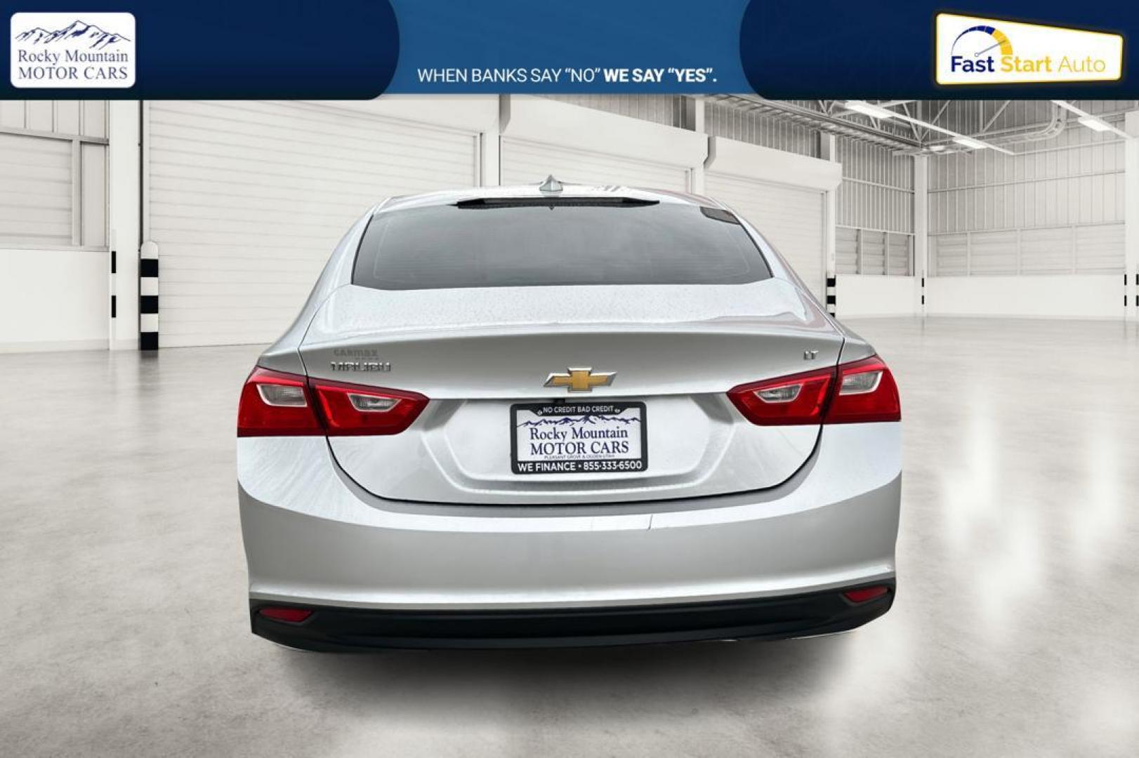 2018 Silver Chevrolet Malibu LT (1G1ZD5ST9JF) with an 1.5L L4 DOHC 16V engine, 6A transmission, located at 344 S Washington Blvd, Ogden, UT, 84404, (801) 399-1799, 41.255482, -111.970848 - Photo#4