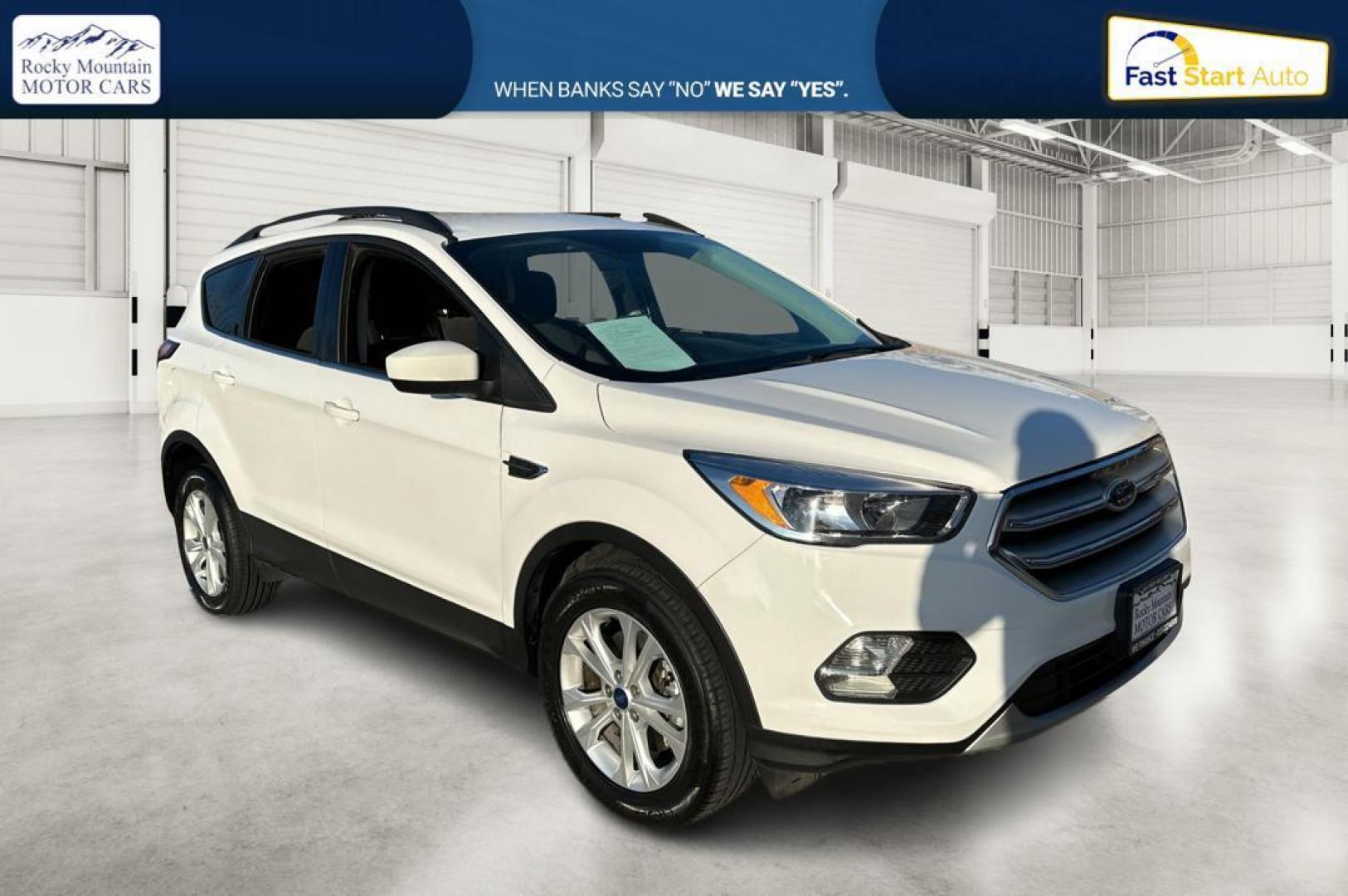 2018 White Ford Escape SE FWD (1FMCU0G92JU) with an 2.0L L4 DOHC 16V engine, 6A transmission, located at 7755 State Street, Midvale, UT, 84047, (801) 753-9063, 40.610329, -111.890656 - Photo#0