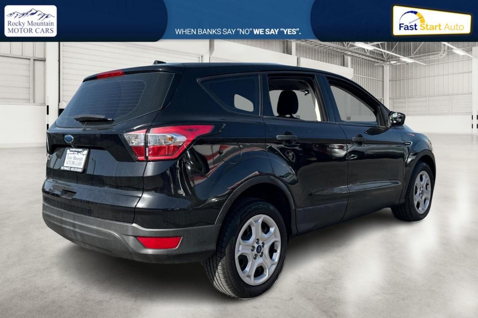 2018 Black Ford Escape S FWD (1FMCU0F79JU) with an 2.5L L4 DOHC 16V engine, 6A transmission, located at 767 S State Road, Pleasant Grove, UT, 84062, (801) 785-1058, 40.354839, -111.736687 - Photo#2