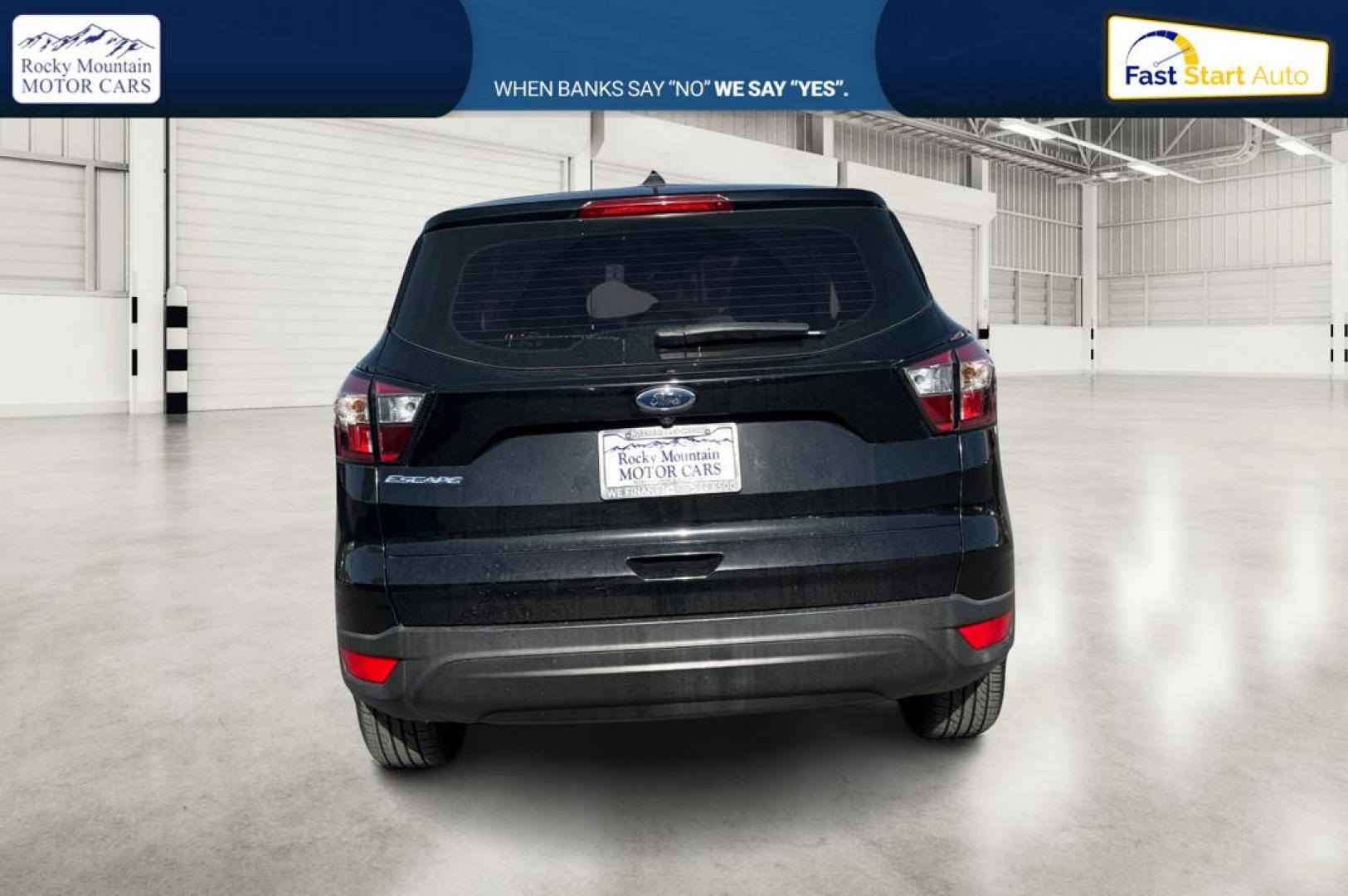 2018 Black Ford Escape S FWD (1FMCU0F79JU) with an 2.5L L4 DOHC 16V engine, 6A transmission, located at 767 S State Road, Pleasant Grove, UT, 84062, (801) 785-1058, 40.354839, -111.736687 - Photo#4