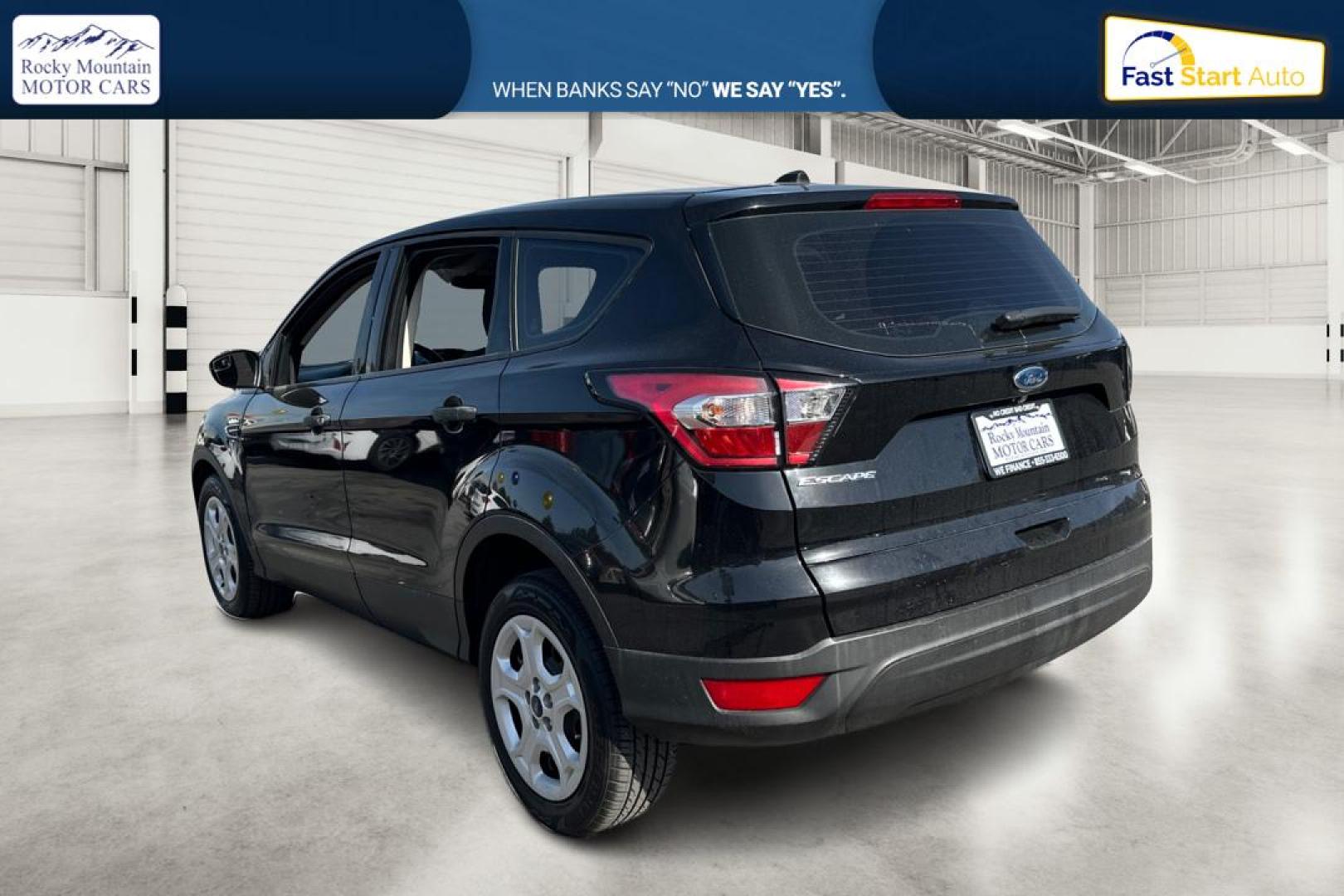 2018 Black Ford Escape S FWD (1FMCU0F79JU) with an 2.5L L4 DOHC 16V engine, 6A transmission, located at 767 S State Road, Pleasant Grove, UT, 84062, (801) 785-1058, 40.354839, -111.736687 - Photo#5