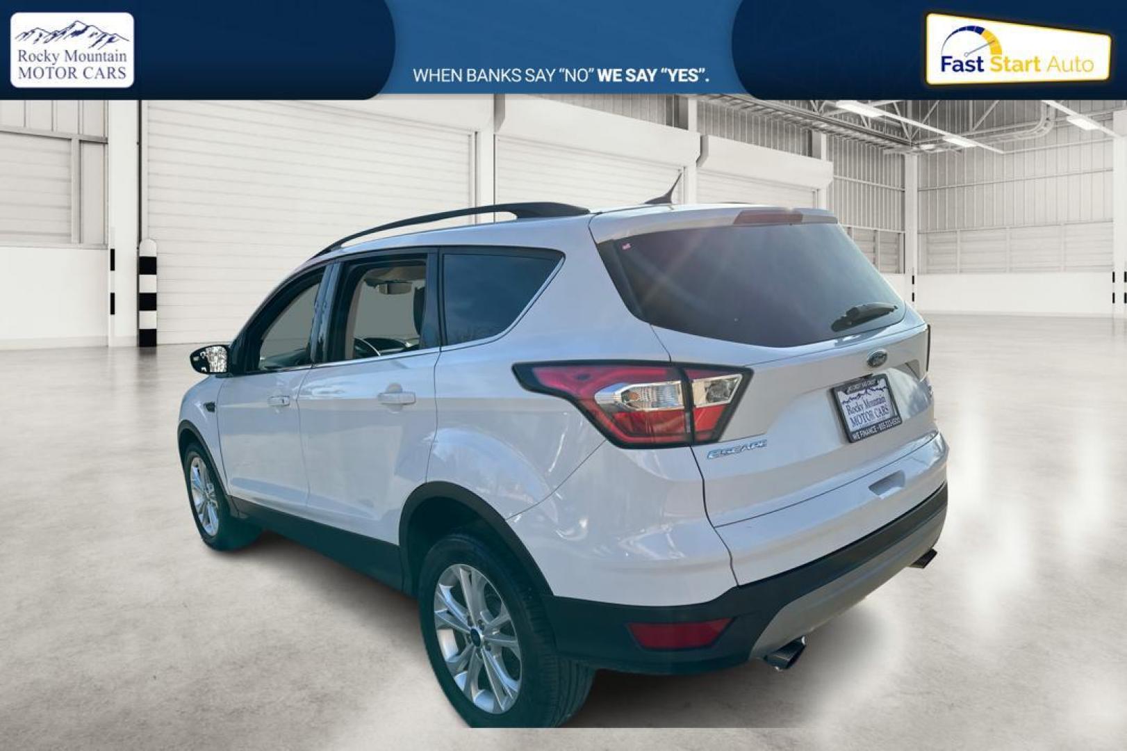 2018 White Ford Escape SE FWD (1FMCU0G92JU) with an 2.0L L4 DOHC 16V engine, 6A transmission, located at 7755 State Street, Midvale, UT, 84047, (801) 753-9063, 40.610329, -111.890656 - Photo#4