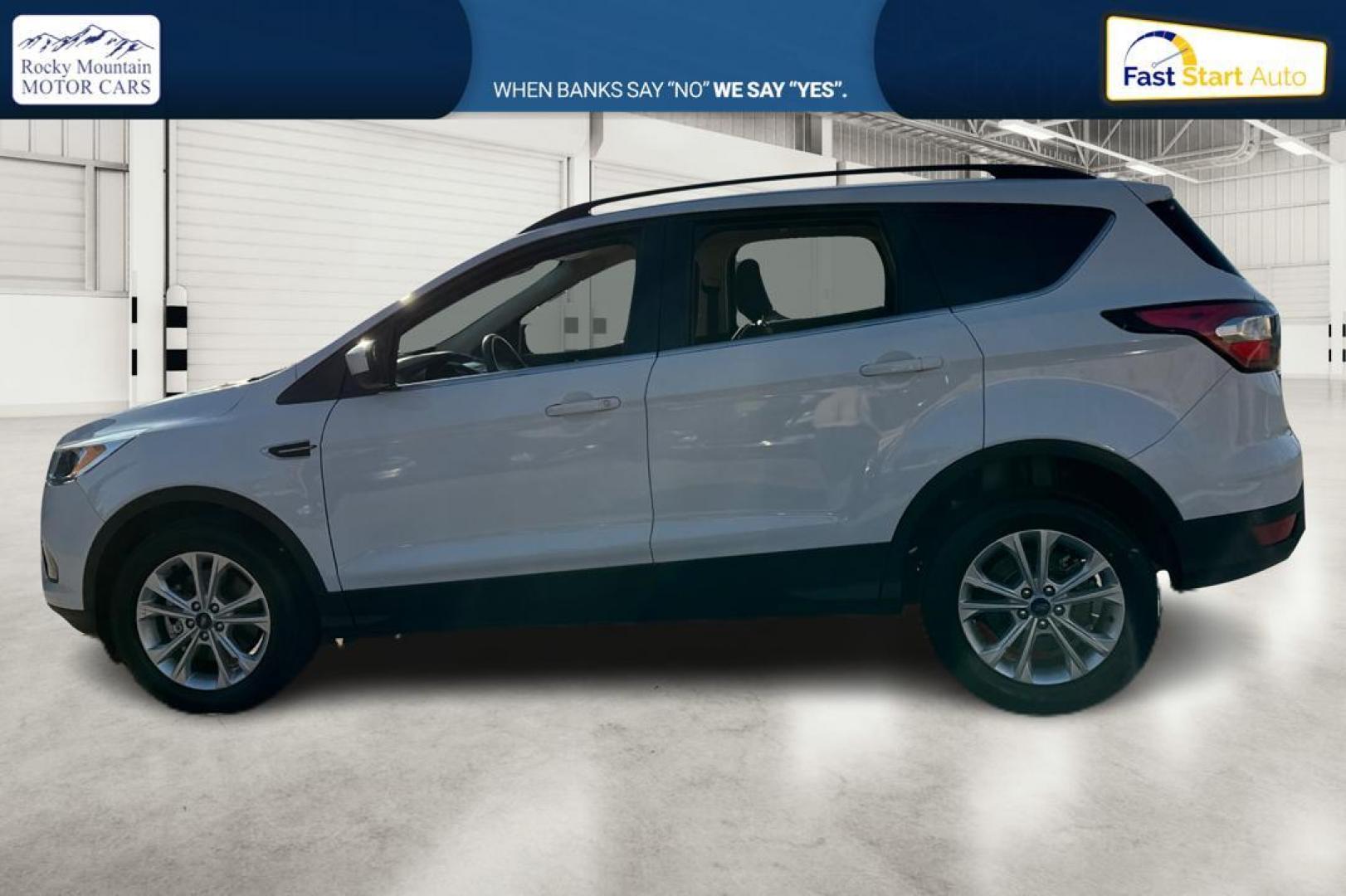 2018 White Ford Escape SE FWD (1FMCU0G92JU) with an 2.0L L4 DOHC 16V engine, 6A transmission, located at 7755 State Street, Midvale, UT, 84047, (801) 753-9063, 40.610329, -111.890656 - Photo#5