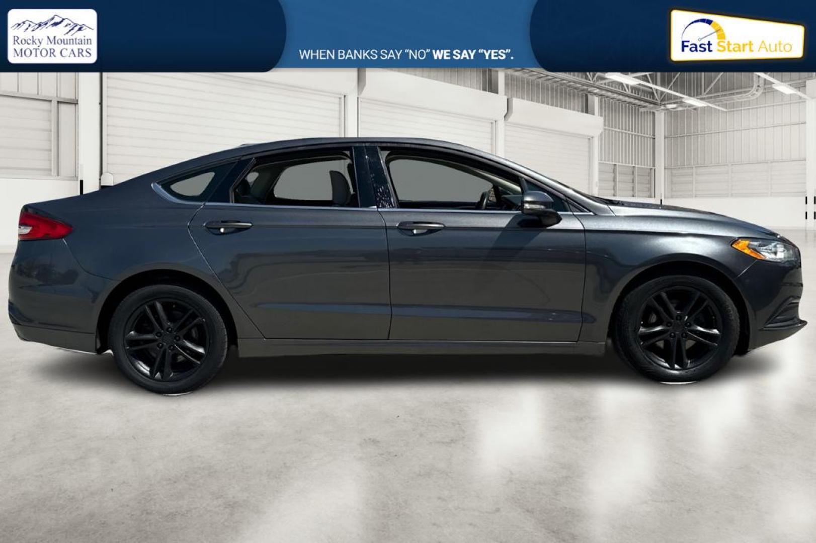 2018 Gray Ford Fusion SE (3FA6P0HD7JR) with an 1.5L L4 DOHC 16V engine, 6A transmission, located at 7755 State Street, Midvale, UT, 84047, (801) 753-9063, 40.610329, -111.890656 - Photo#1