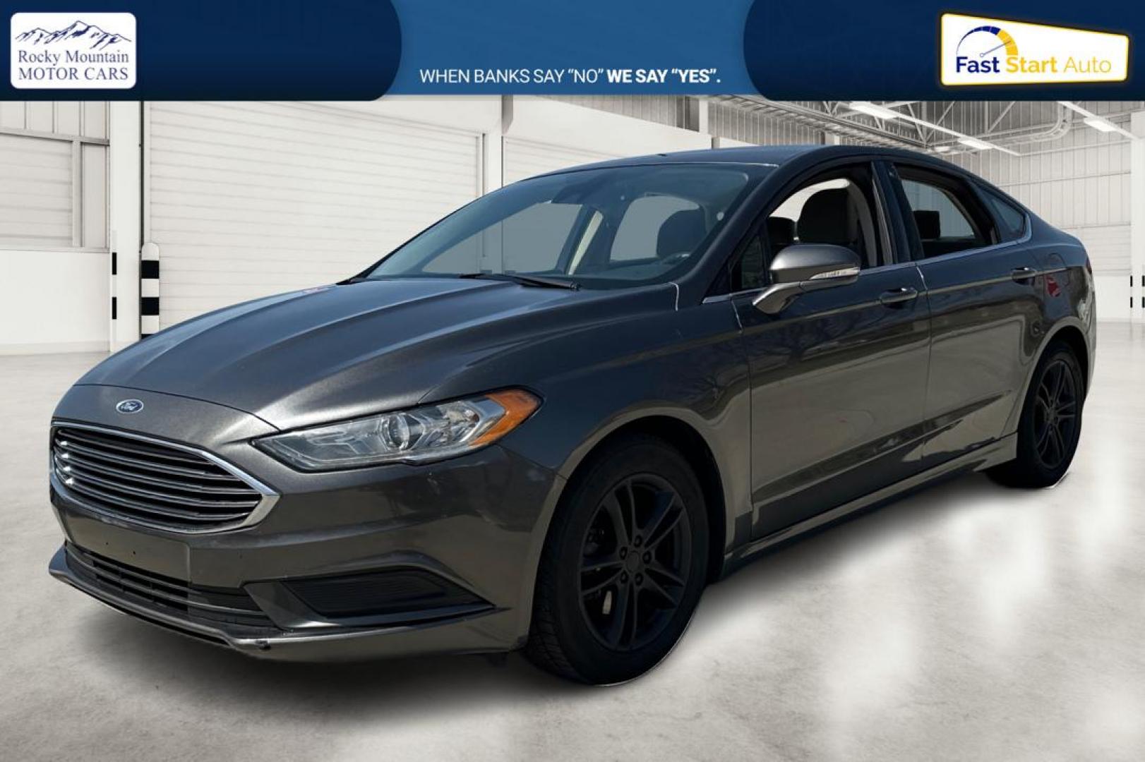 2018 Gray Ford Fusion SE (3FA6P0HD7JR) with an 1.5L L4 DOHC 16V engine, 6A transmission, located at 7755 State Street, Midvale, UT, 84047, (801) 753-9063, 40.610329, -111.890656 - Photo#8