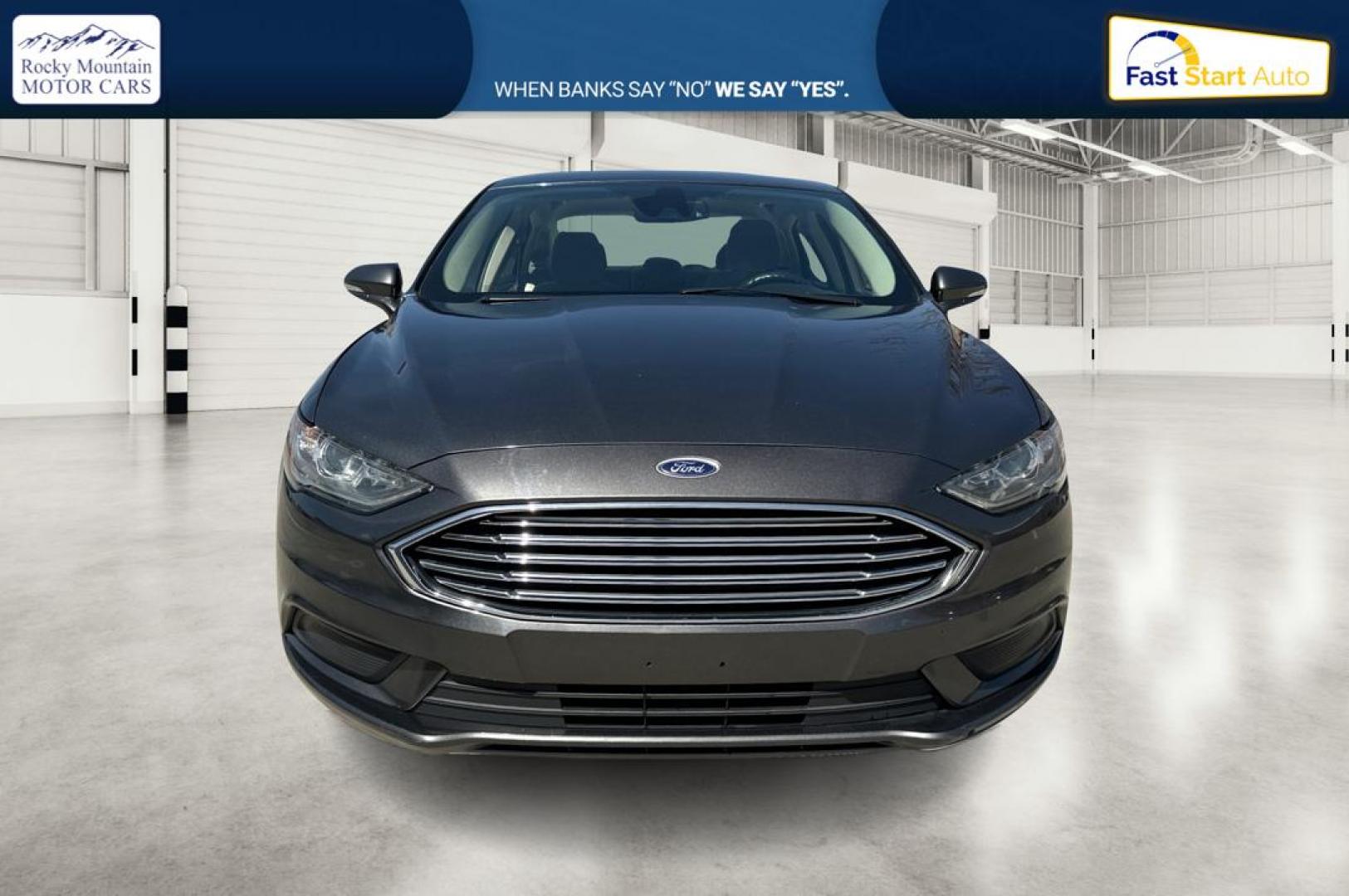 2018 Gray Ford Fusion SE (3FA6P0HD7JR) with an 1.5L L4 DOHC 16V engine, 6A transmission, located at 7755 State Street, Midvale, UT, 84047, (801) 753-9063, 40.610329, -111.890656 - Photo#9