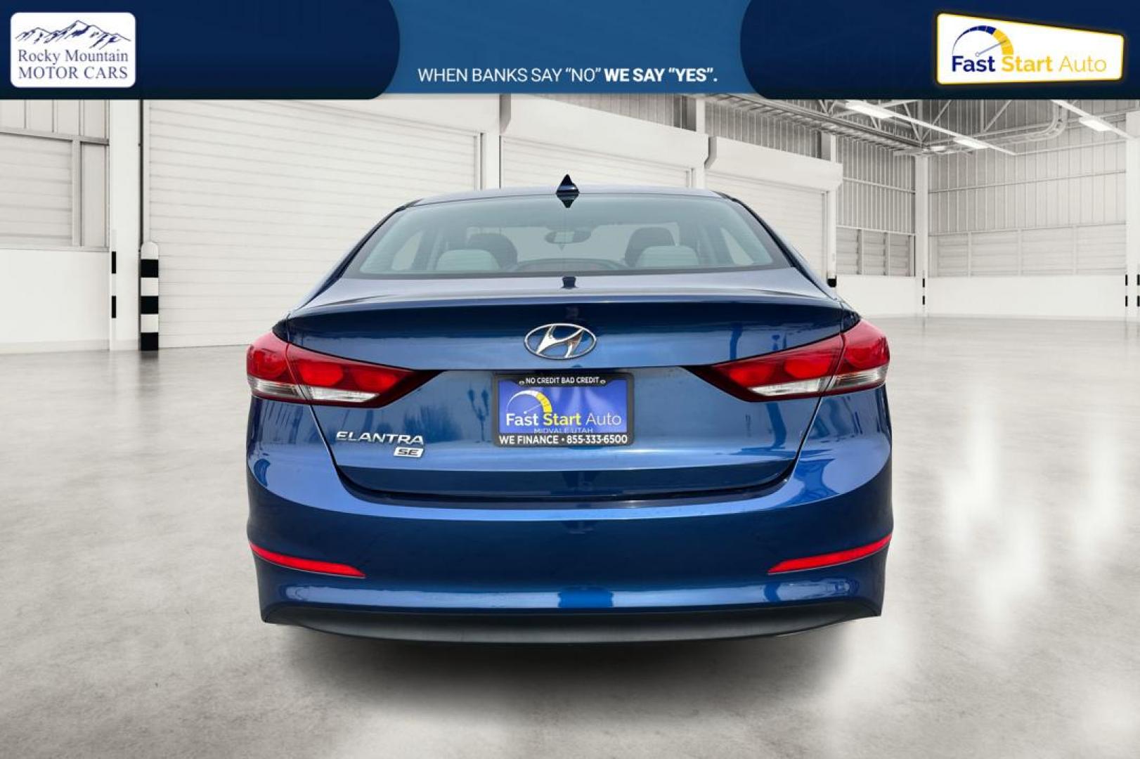 2018 Blue Hyundai Elantra SE 6AT (5NPD74LF1JH) with an 1.8L L4 DOHC 16V engine, 6A transmission, located at 7755 State Street, Midvale, UT, 84047, (801) 753-9063, 40.610329, -111.890656 - Photo#4
