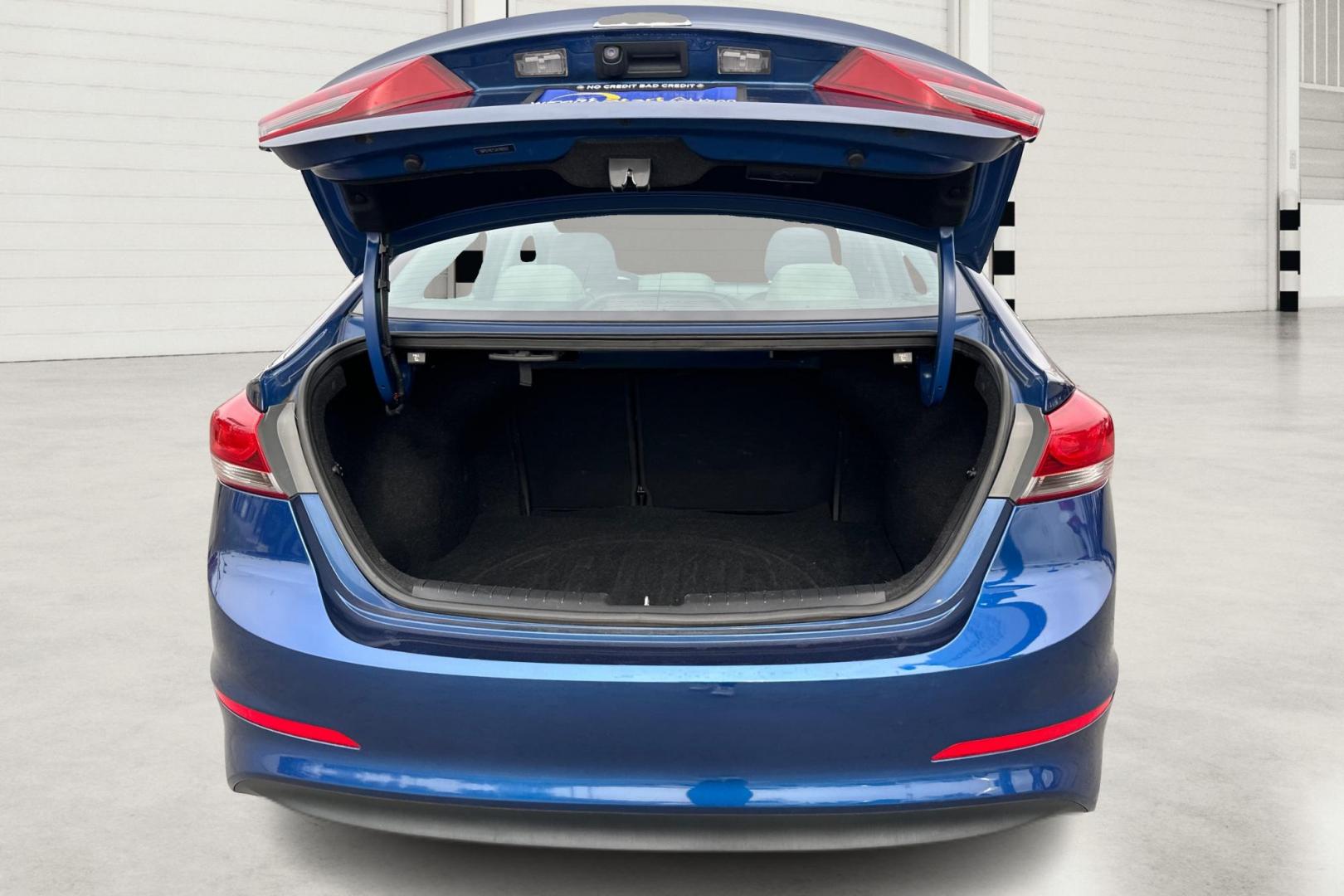 2018 Blue Hyundai Elantra SE 6AT (5NPD74LF1JH) with an 1.8L L4 DOHC 16V engine, 6A transmission, located at 7755 State Street, Midvale, UT, 84047, (801) 753-9063, 40.610329, -111.890656 - Photo#13