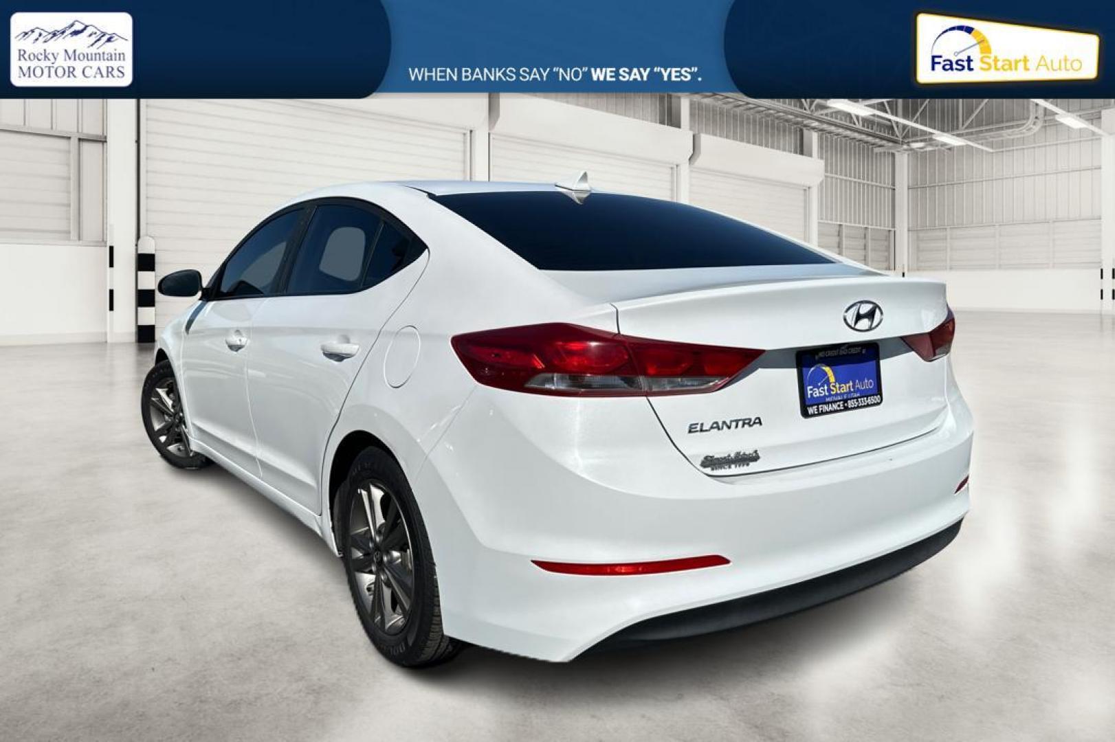 2018 White Hyundai Elantra Limited (5NPD84LF0JH) with an 1.8L L4 DOHC 16V engine, 6A transmission, located at 7755 State Street, Midvale, UT, 84047, (801) 753-9063, 40.610329, -111.890656 - Photo#4