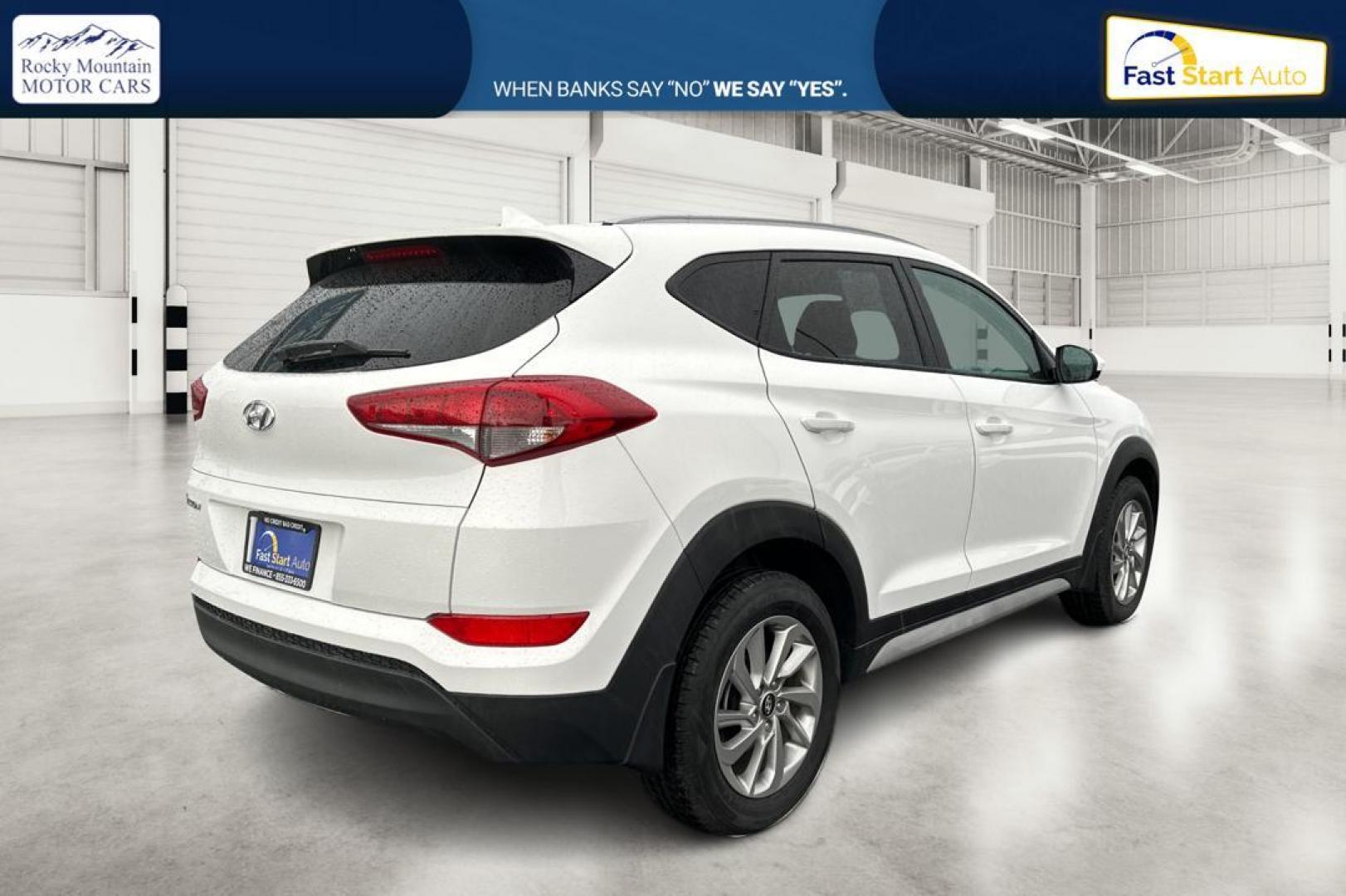 2018 White Hyundai Tucson SE (KM8J33A48JU) with an 2.0L L4 DOHC 16V engine, 6A transmission, located at 7755 State Street, Midvale, UT, 84047, (801) 753-9063, 40.610329, -111.890656 - Photo#2