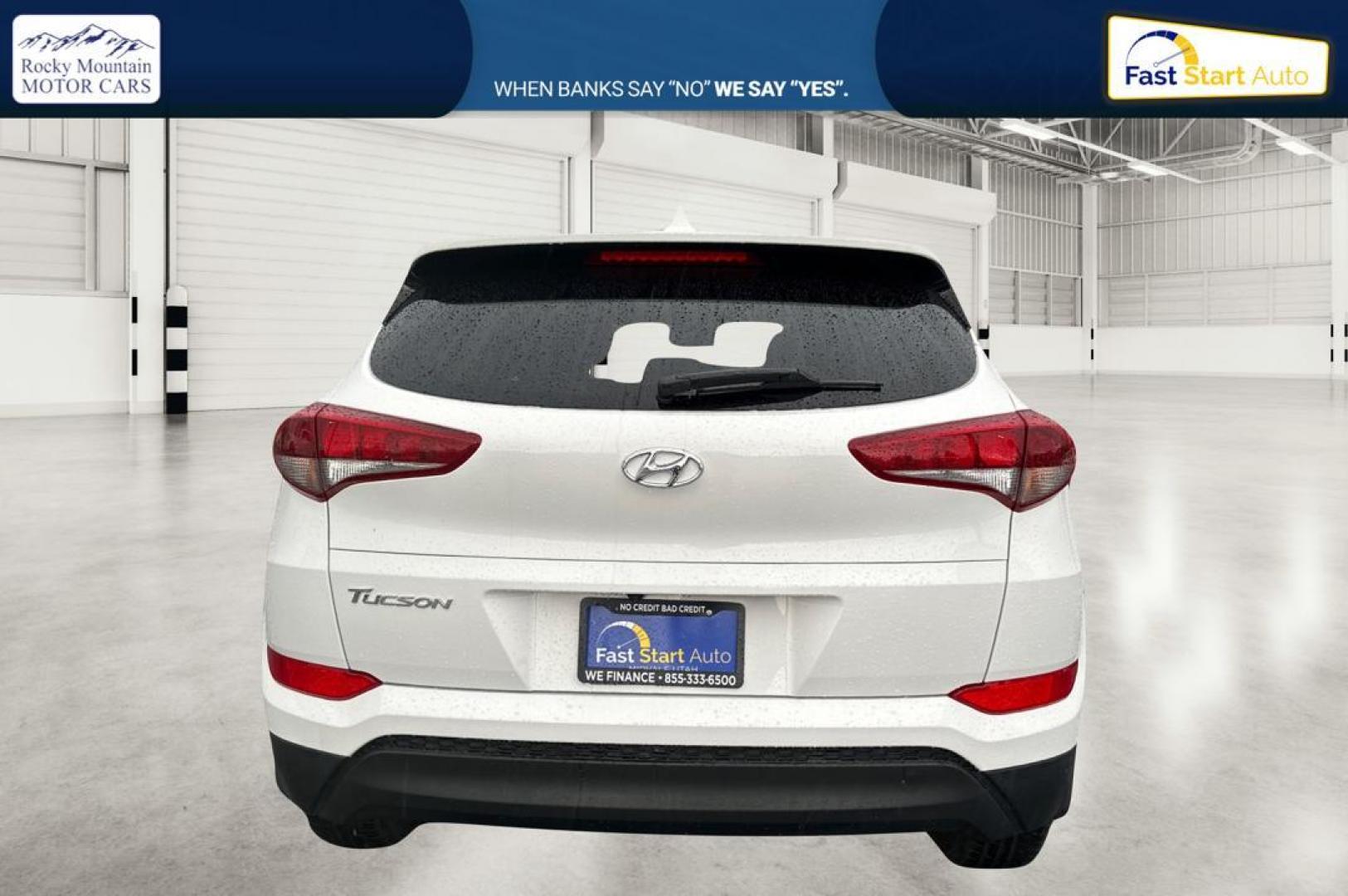 2018 White Hyundai Tucson SE (KM8J33A48JU) with an 2.0L L4 DOHC 16V engine, 6A transmission, located at 7755 State Street, Midvale, UT, 84047, (801) 753-9063, 40.610329, -111.890656 - Photo#4