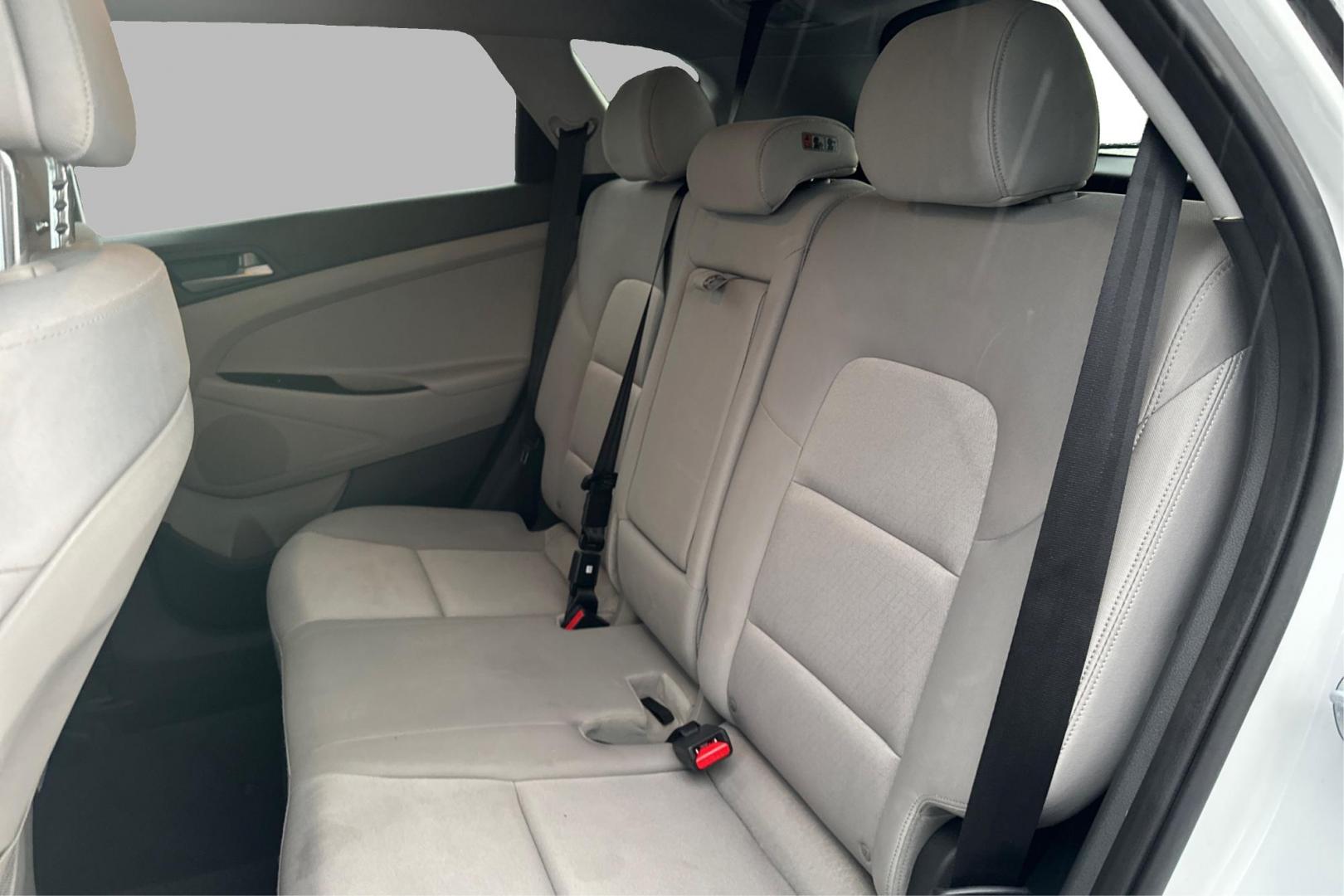 2018 White Hyundai Tucson SE (KM8J33A48JU) with an 2.0L L4 DOHC 16V engine, 6A transmission, located at 7755 State Street, Midvale, UT, 84047, (801) 753-9063, 40.610329, -111.890656 - Photo#14