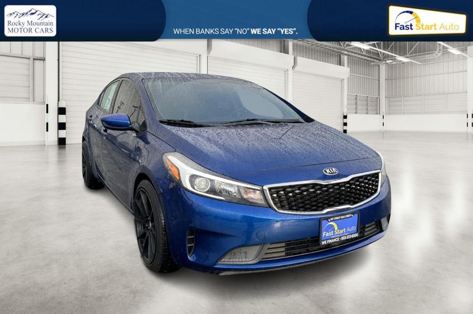 2018 Blue Kia Forte LX 6M (3KPFK4A77JE) with an 2.0L L4 DOHC 16V engine, 6M transmission, located at 7755 State Street, Midvale, UT, 84047, (801) 753-9063, 40.610329, -111.890656 - Photo#0
