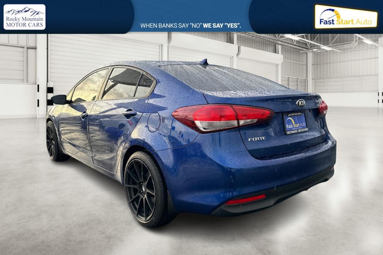 2018 Blue Kia Forte LX 6M (3KPFK4A77JE) with an 2.0L L4 DOHC 16V engine, 6M transmission, located at 7755 State Street, Midvale, UT, 84047, (801) 753-9063, 40.610329, -111.890656 - Photo#5