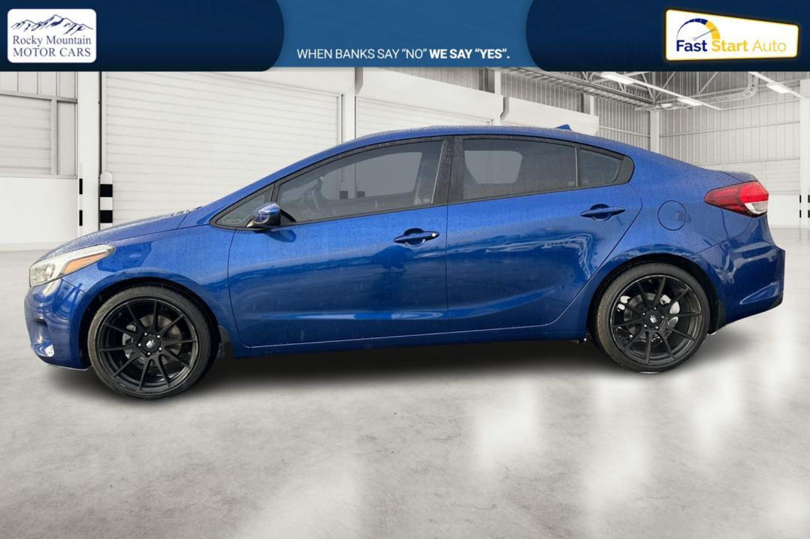 2018 Blue Kia Forte LX 6M (3KPFK4A77JE) with an 2.0L L4 DOHC 16V engine, 6M transmission, located at 7755 State Street, Midvale, UT, 84047, (801) 753-9063, 40.610329, -111.890656 - Photo#6