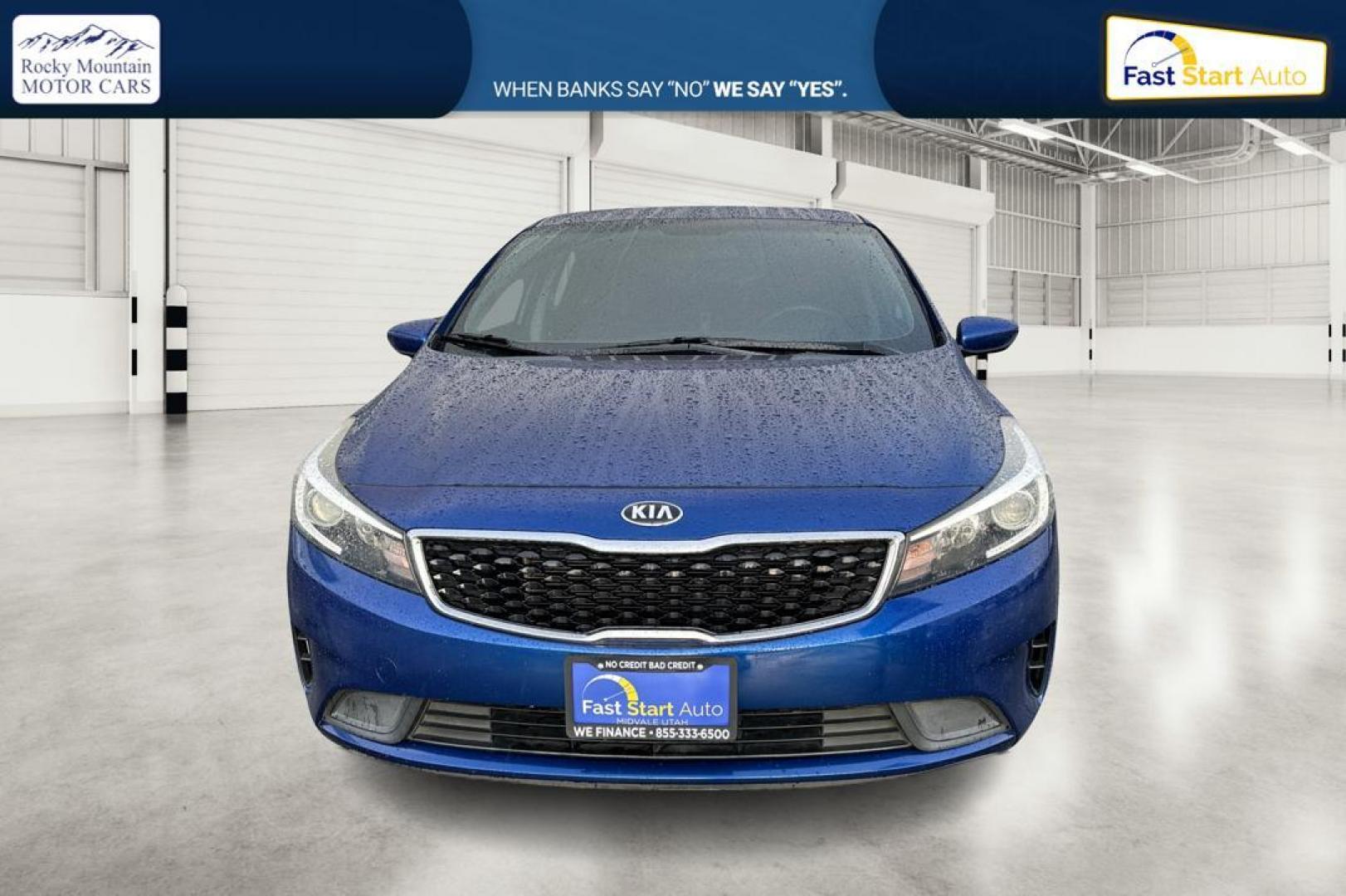 2018 Blue Kia Forte LX 6M (3KPFK4A77JE) with an 2.0L L4 DOHC 16V engine, 6M transmission, located at 7755 State Street, Midvale, UT, 84047, (801) 753-9063, 40.610329, -111.890656 - Photo#9